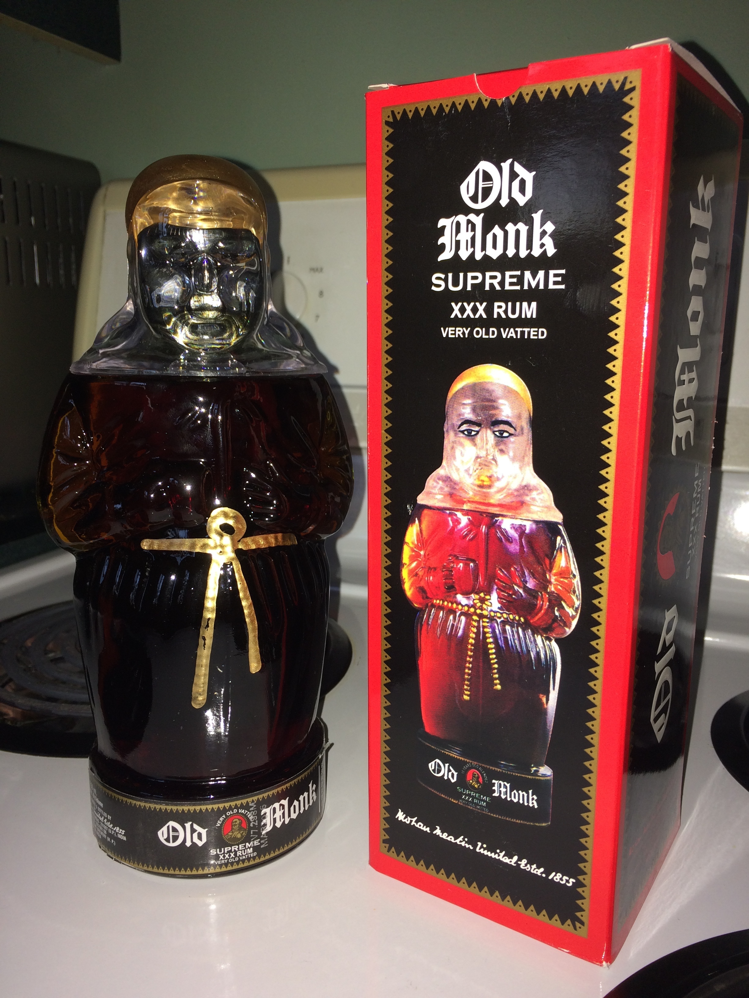 [Photograph] This is Old Monk Rum (special edition w Monk shaped bottle