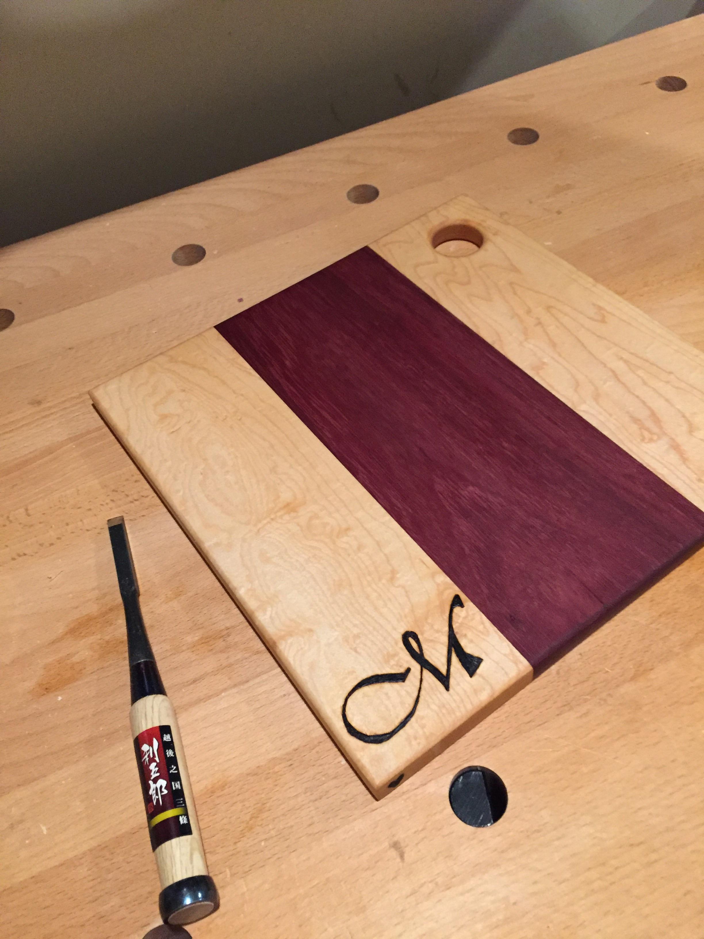 Purple heart and maple cutting board with wood burning. r/woodworking