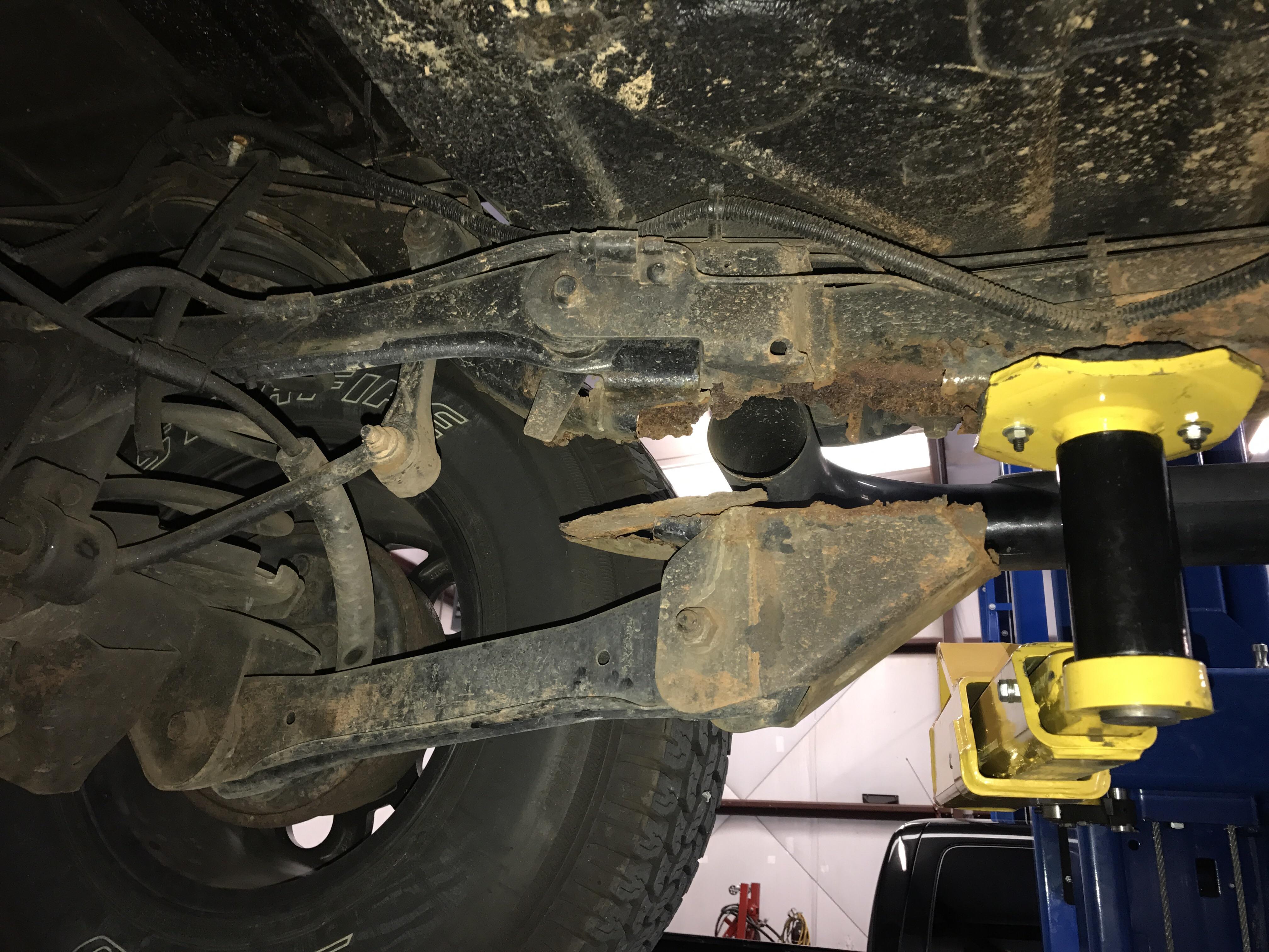 C/S Hears a slight clunk in the rear going over bumps. (Despite how it