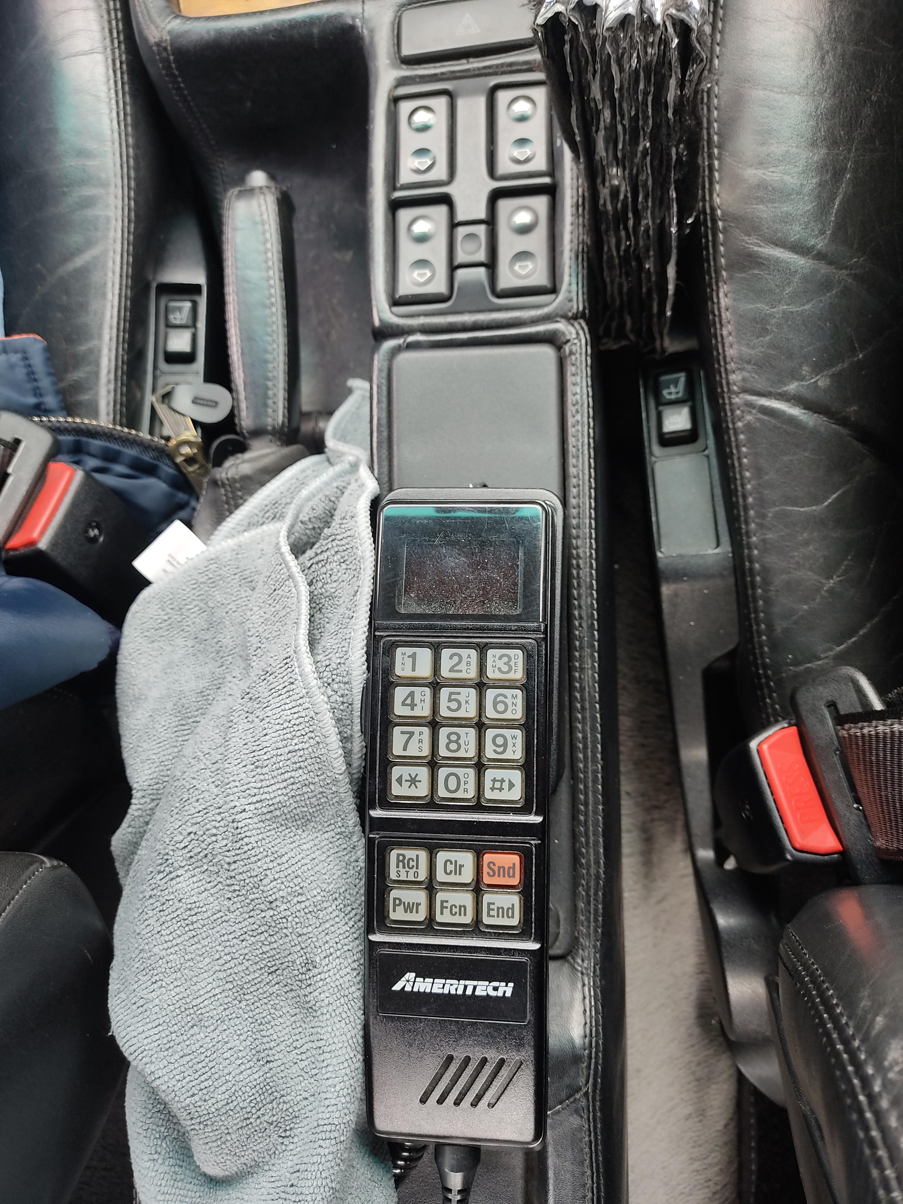 Saw a pretty old car phone, still functional r/mildlyinteresting