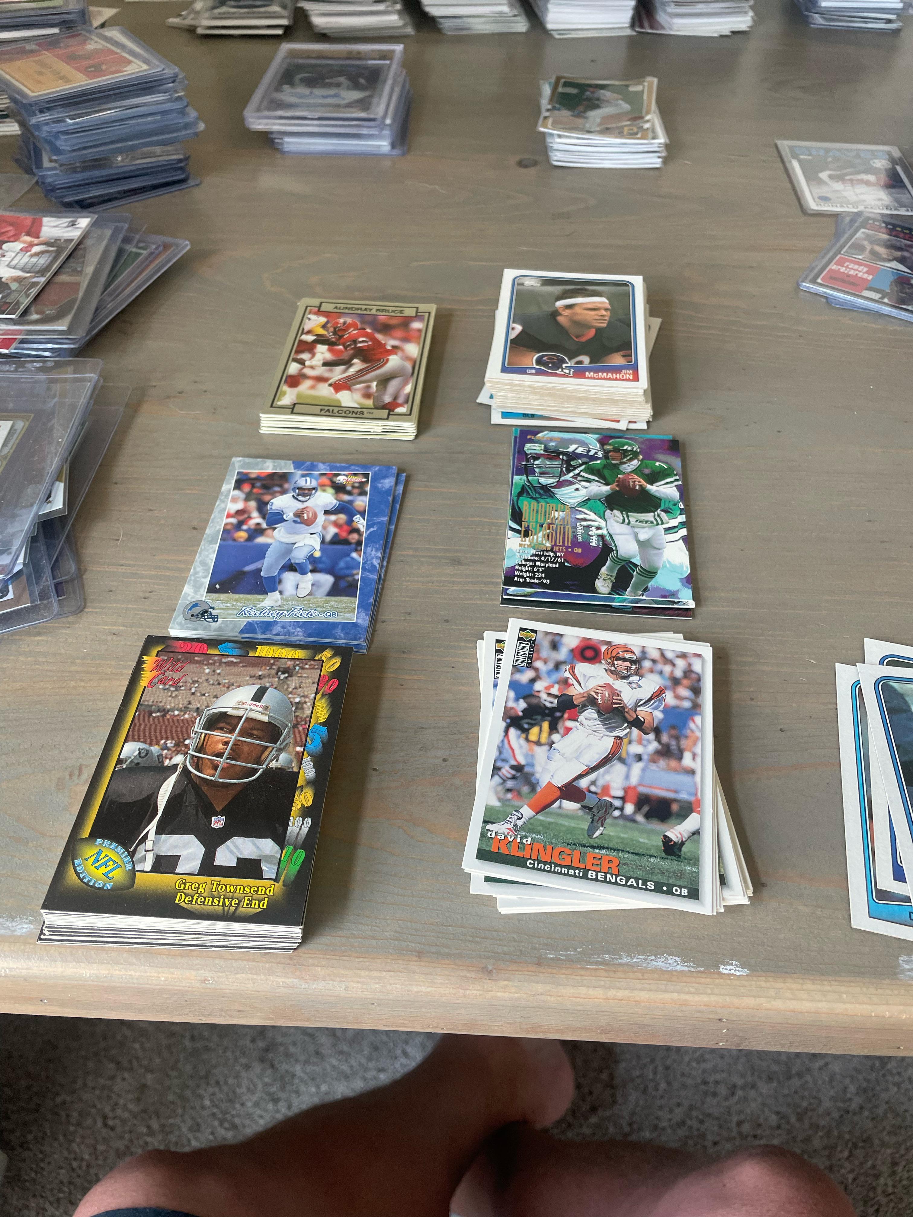 Found some 80/90s pigskin mixed in my baseball card garage sale find