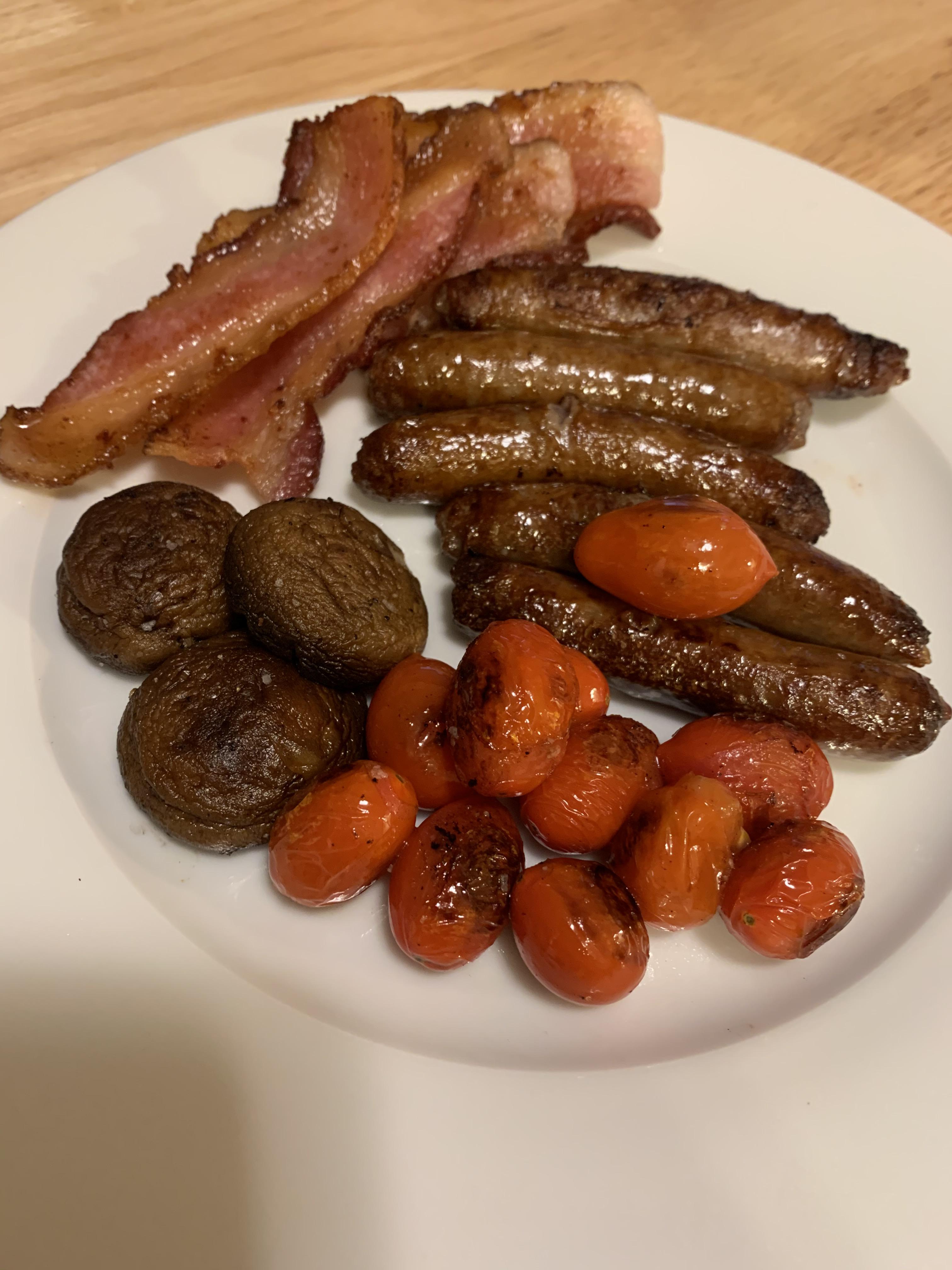 Tomatoes, sausages, and nice crispy bacon. r/lotr