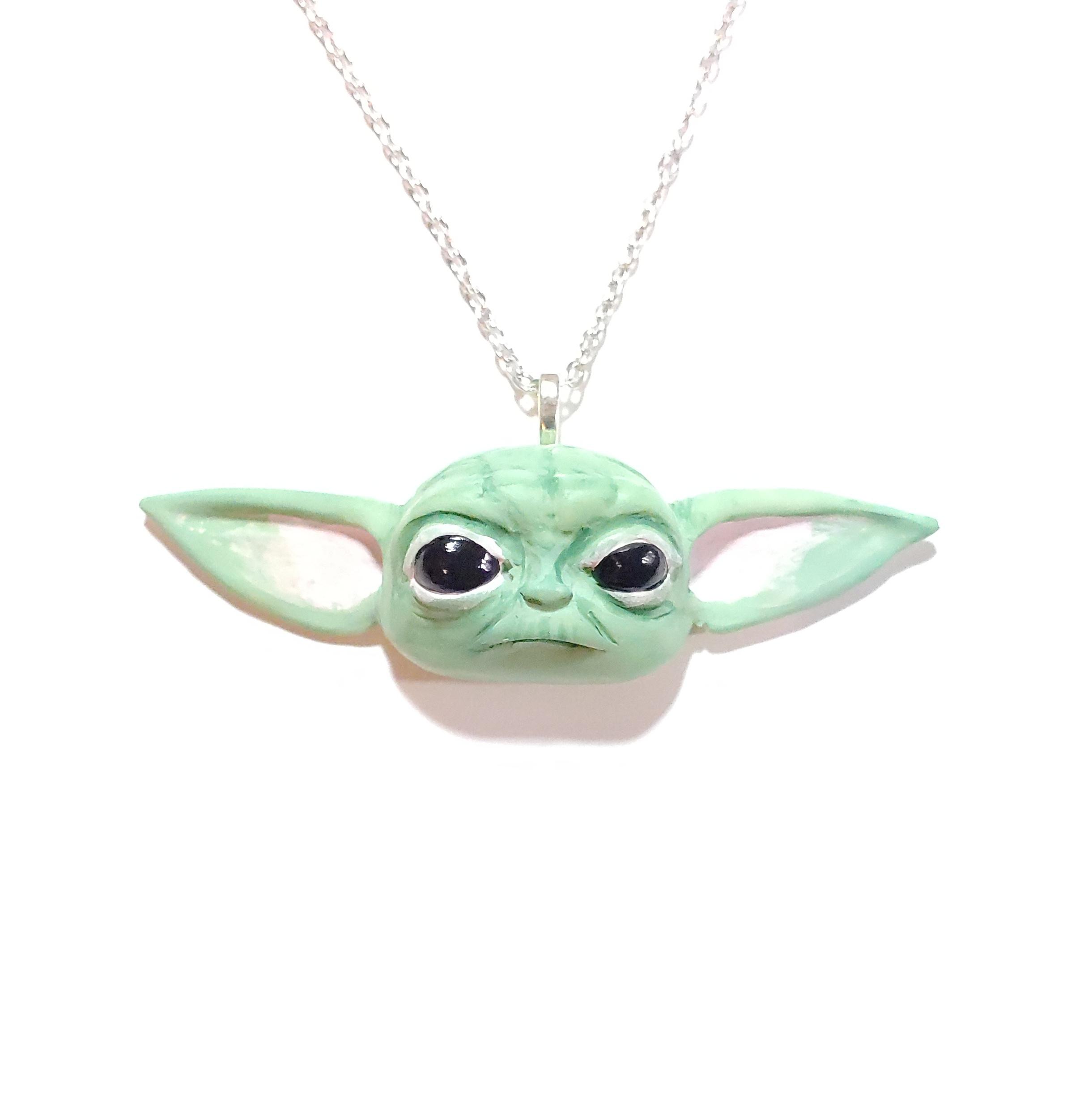 A baby Yoda necklace. r/pics