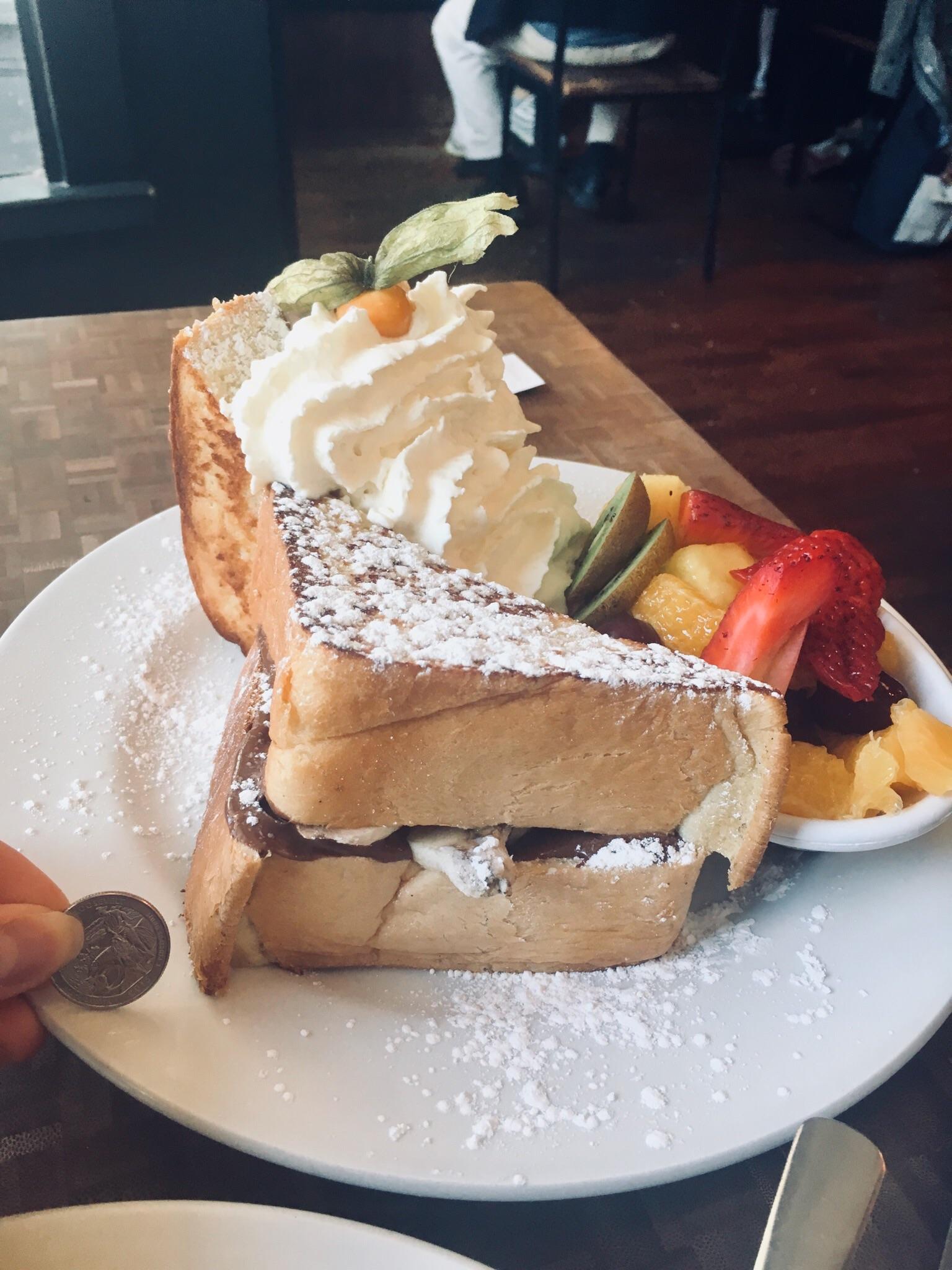 [I ate] Brioche French Toast Sandwich with Nutella and Banana in