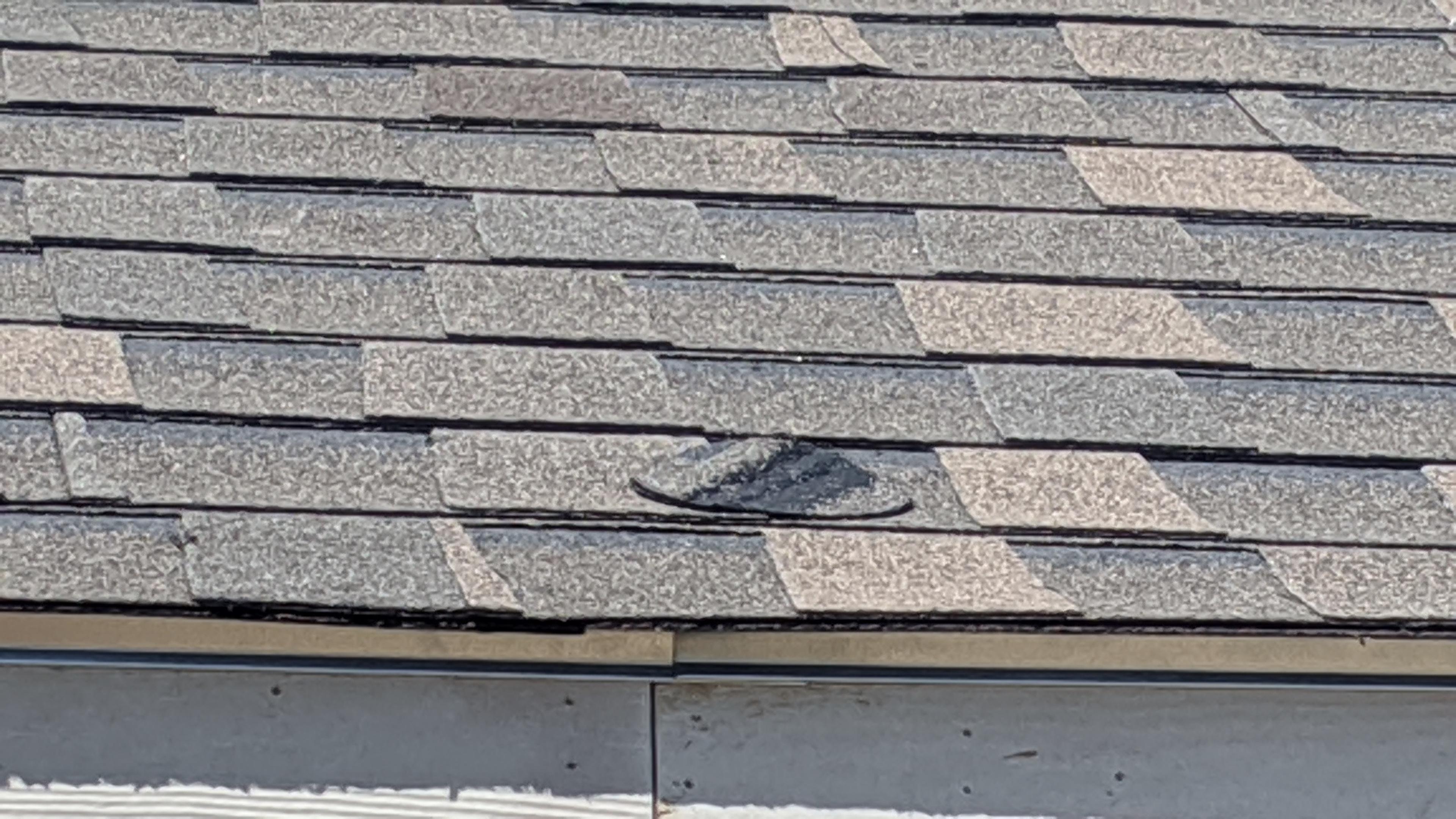 Roofing quality questions. What's the round "patch"? Is it ok? Does the
