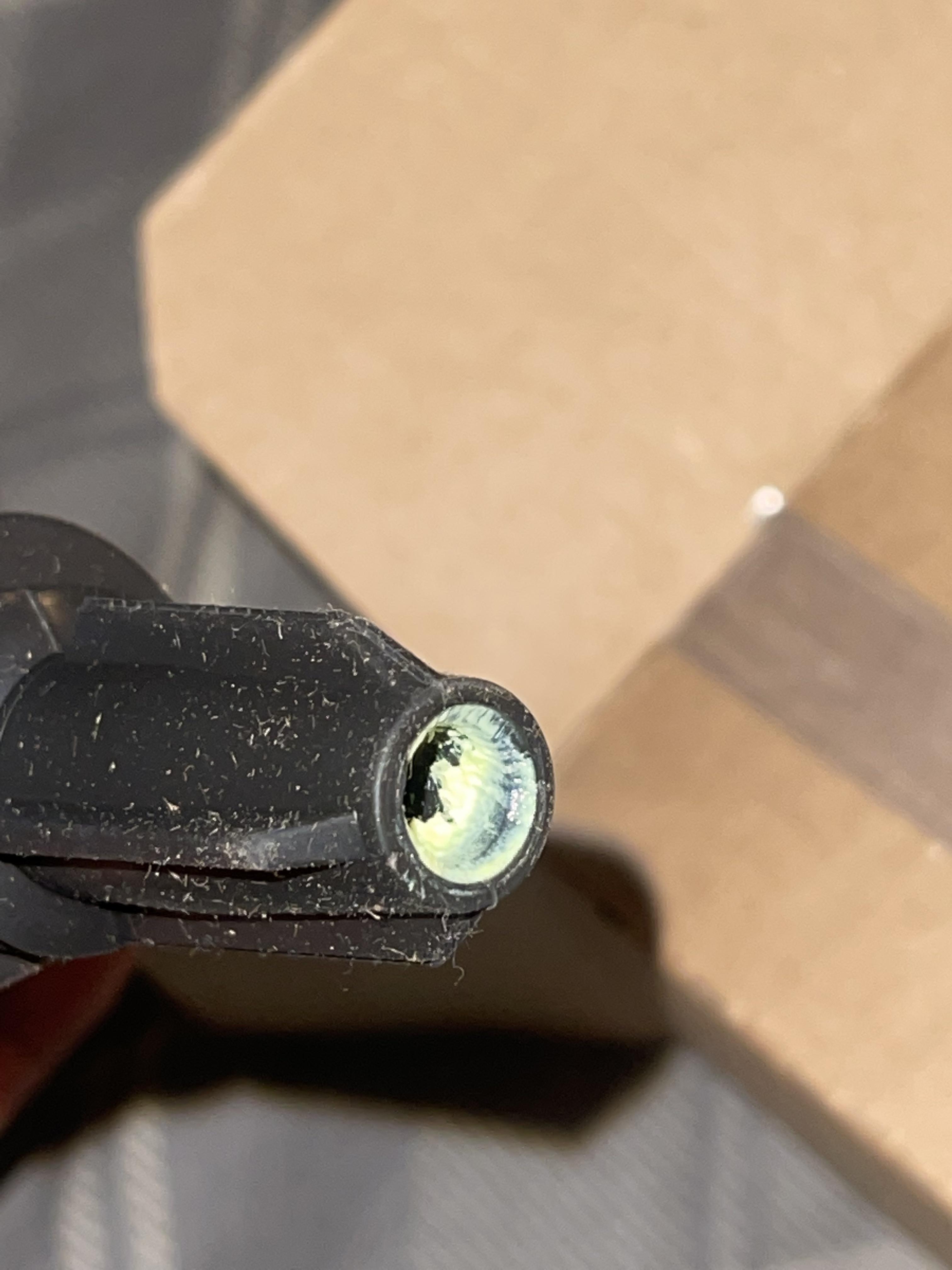 What’s this green stuff on my ignition coils? Should i take it off