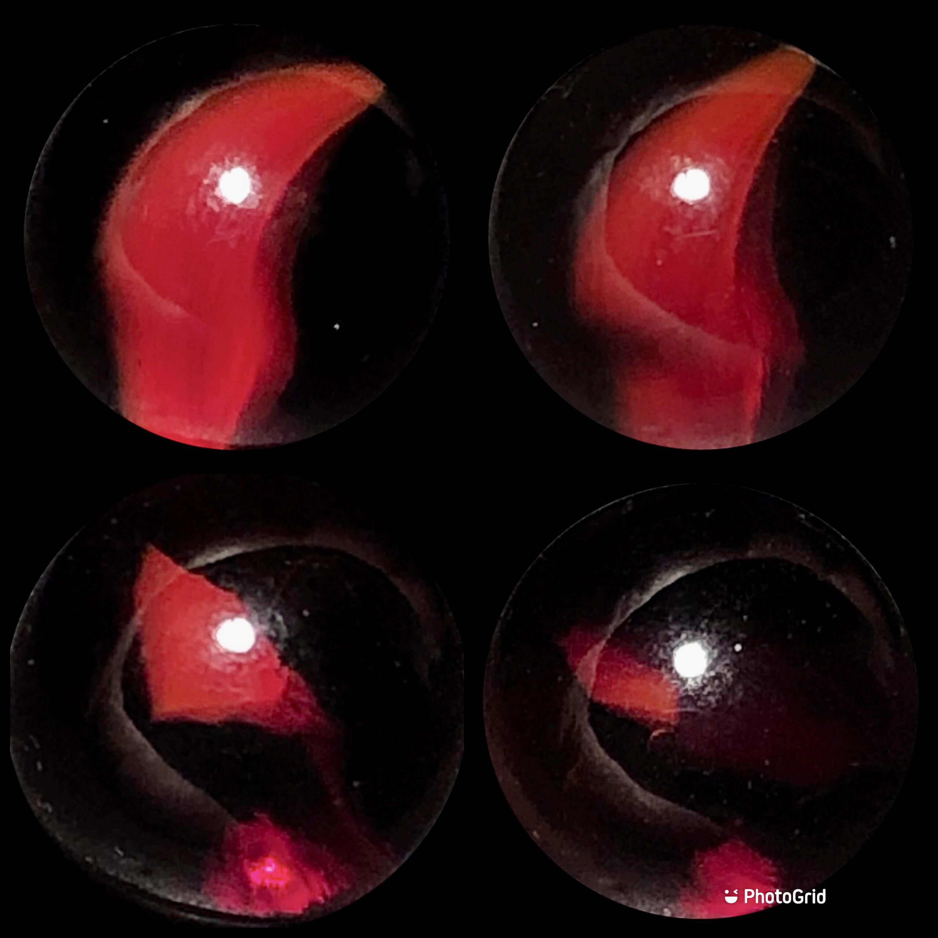365261; a 9/16” red glass cats eye, probably Peltier, circa 192780s