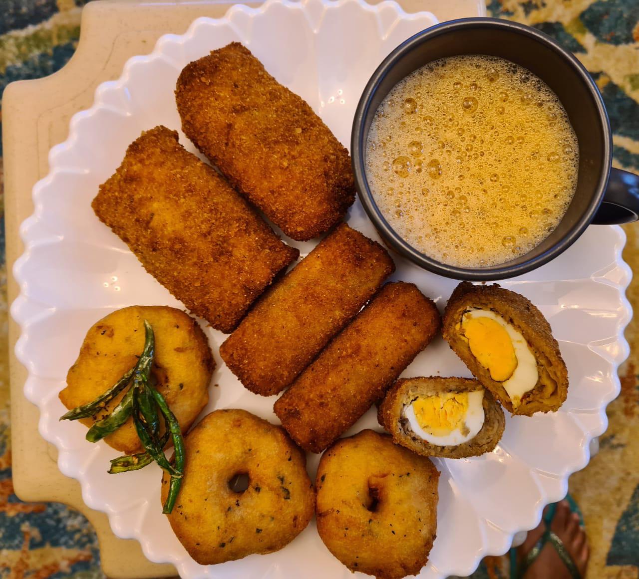 Sri Lankan Fast food made at home ! Fish Roll Egg Roll , Savery Donut aka wadei with a warm Tea