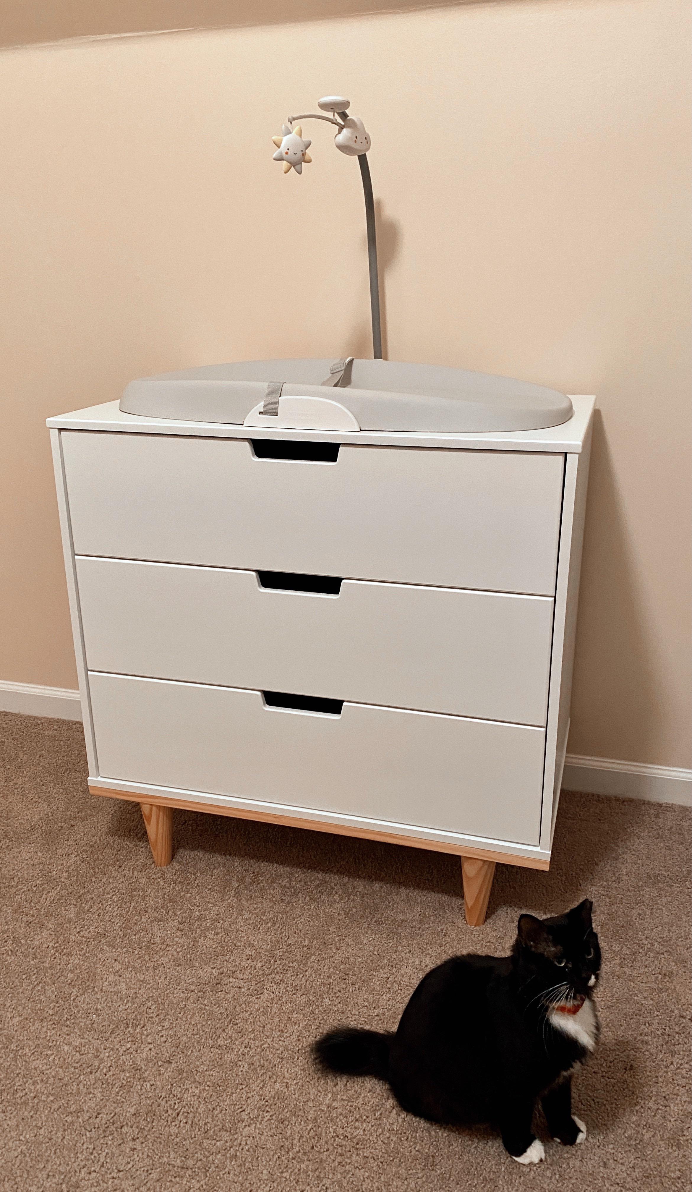 Simple, sleek dresser set up Skip Hop Changing Pad & Baby Mod Marley