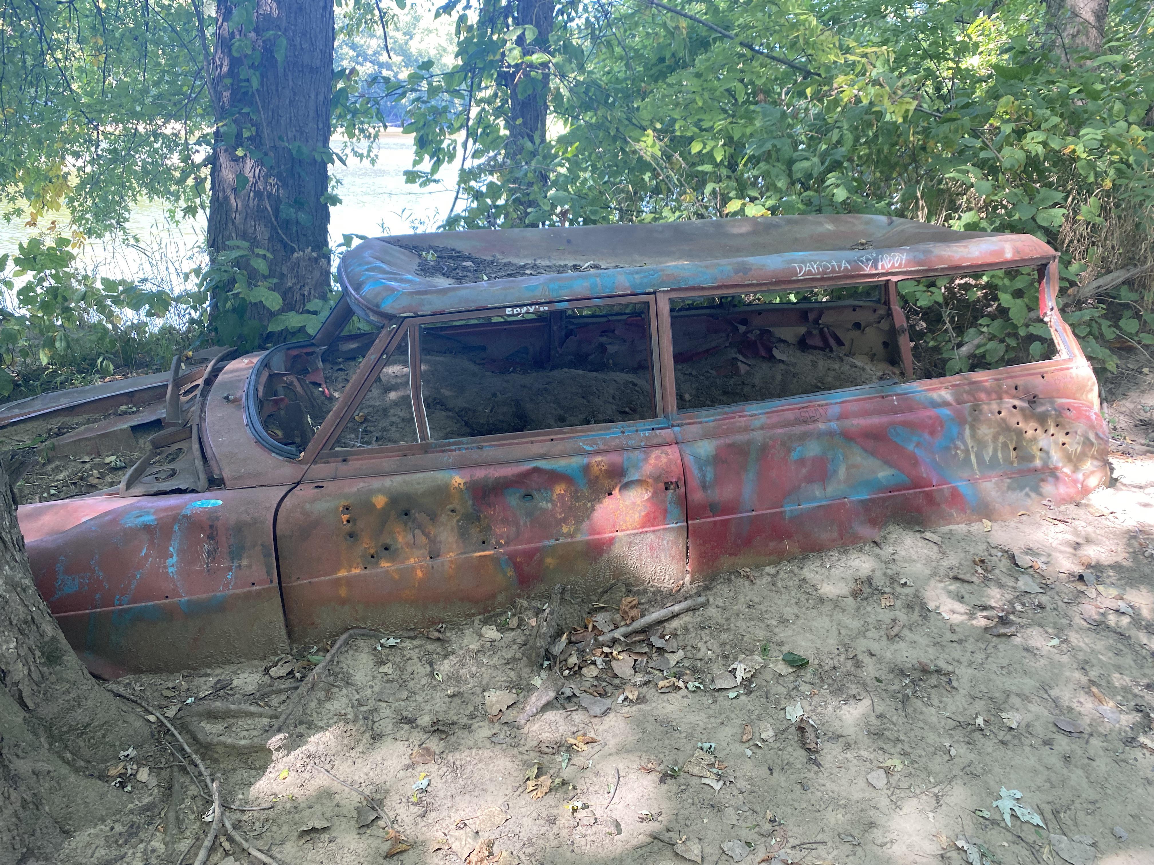 Abandoned vehicle on Wabash Heritage Trail in Lafayette, Indiana r