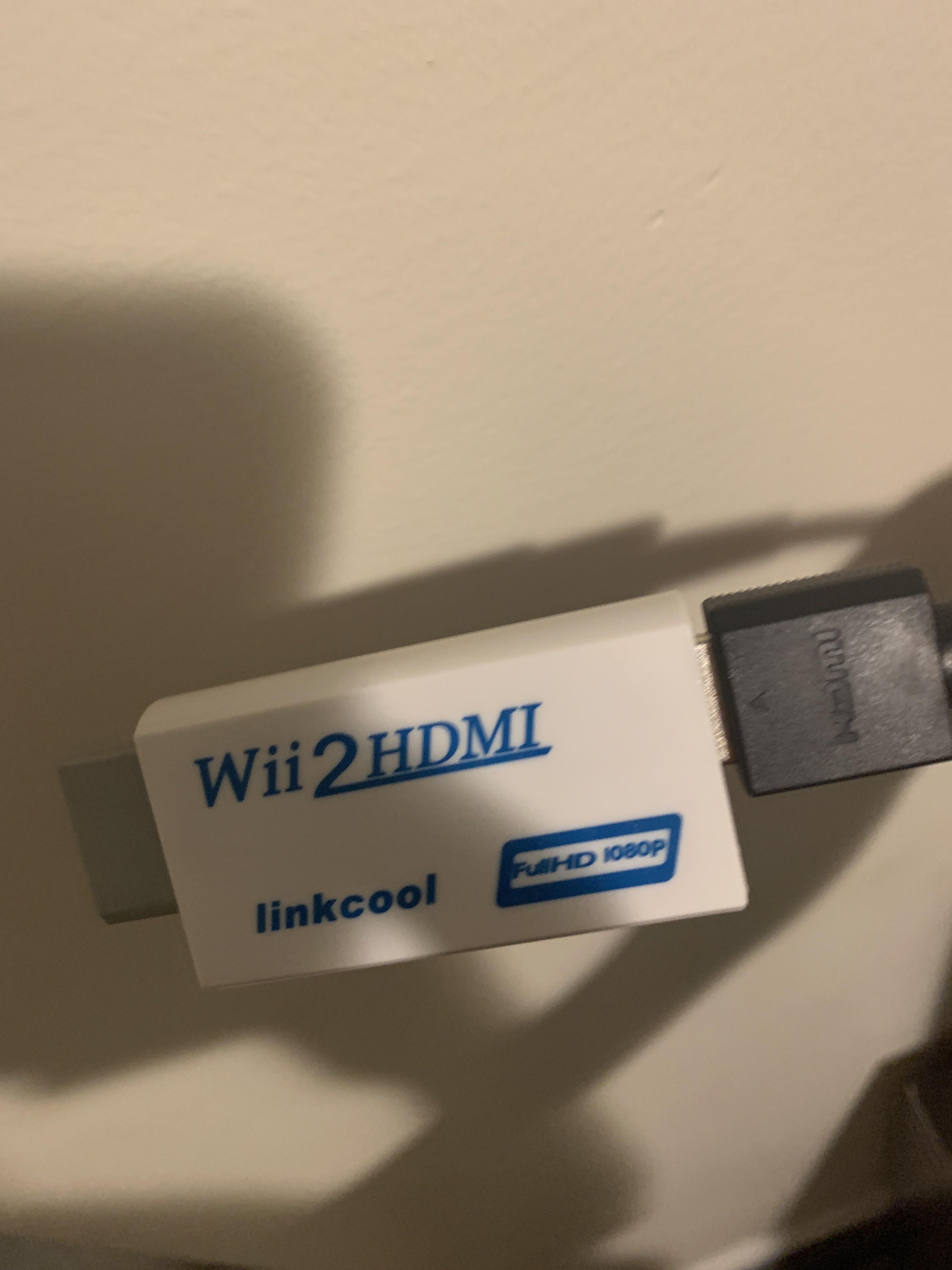 I got this Wii to HDMI converter off of Amazon. My Wii works fine when