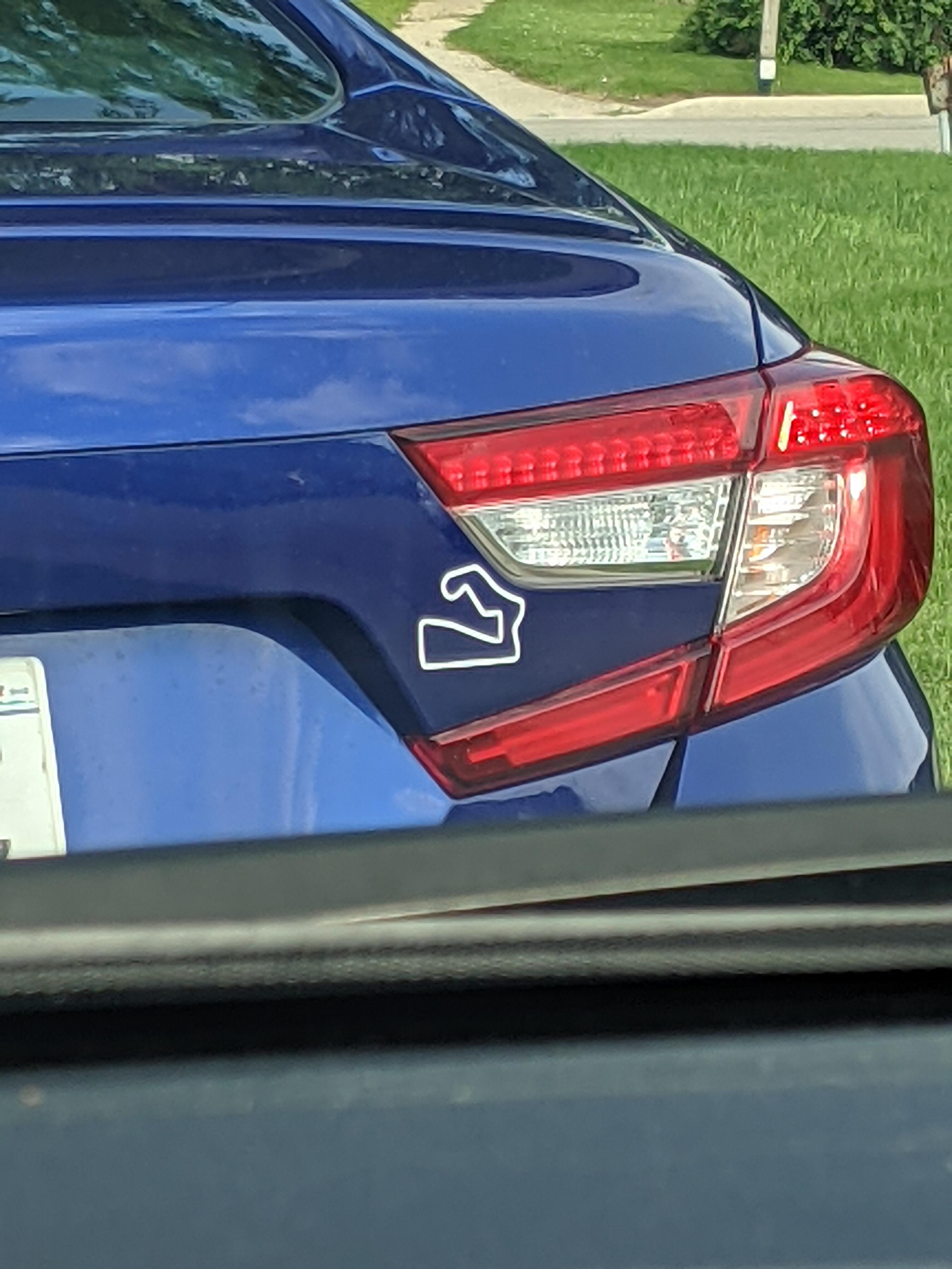 What is this bumper sticker symbol? Seen a few in Wisconsin r/Whatisthis