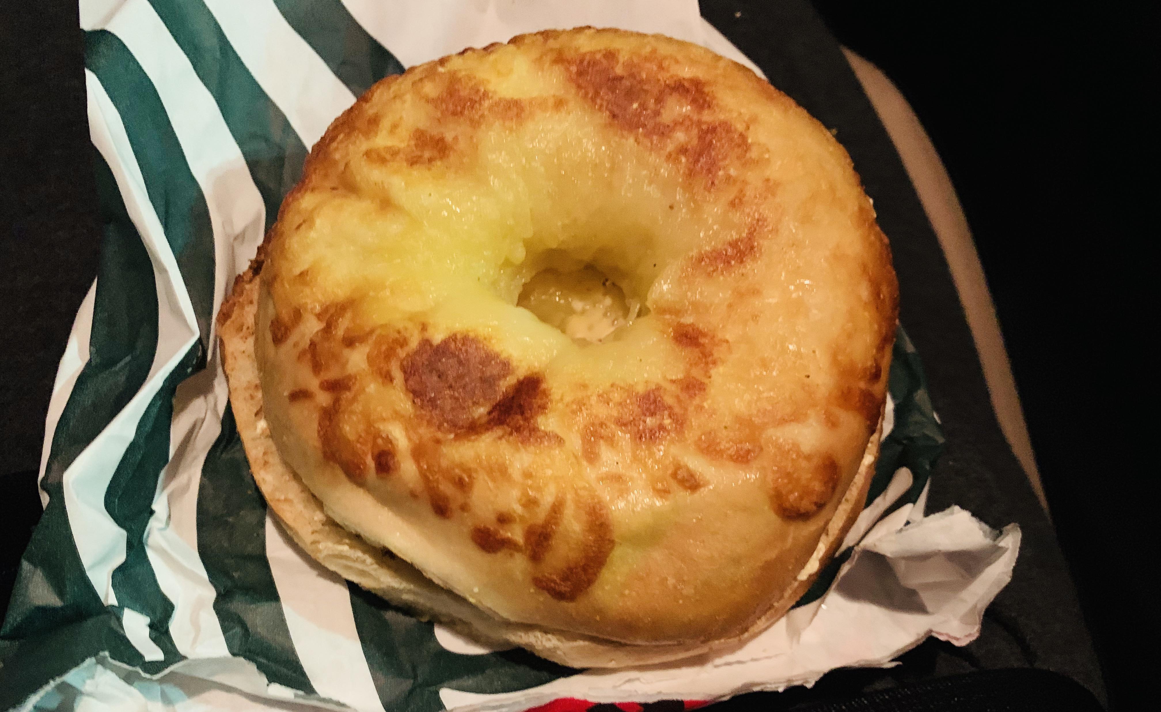 18 hour drive finally in New York Asiago Bagel with globs of butter r