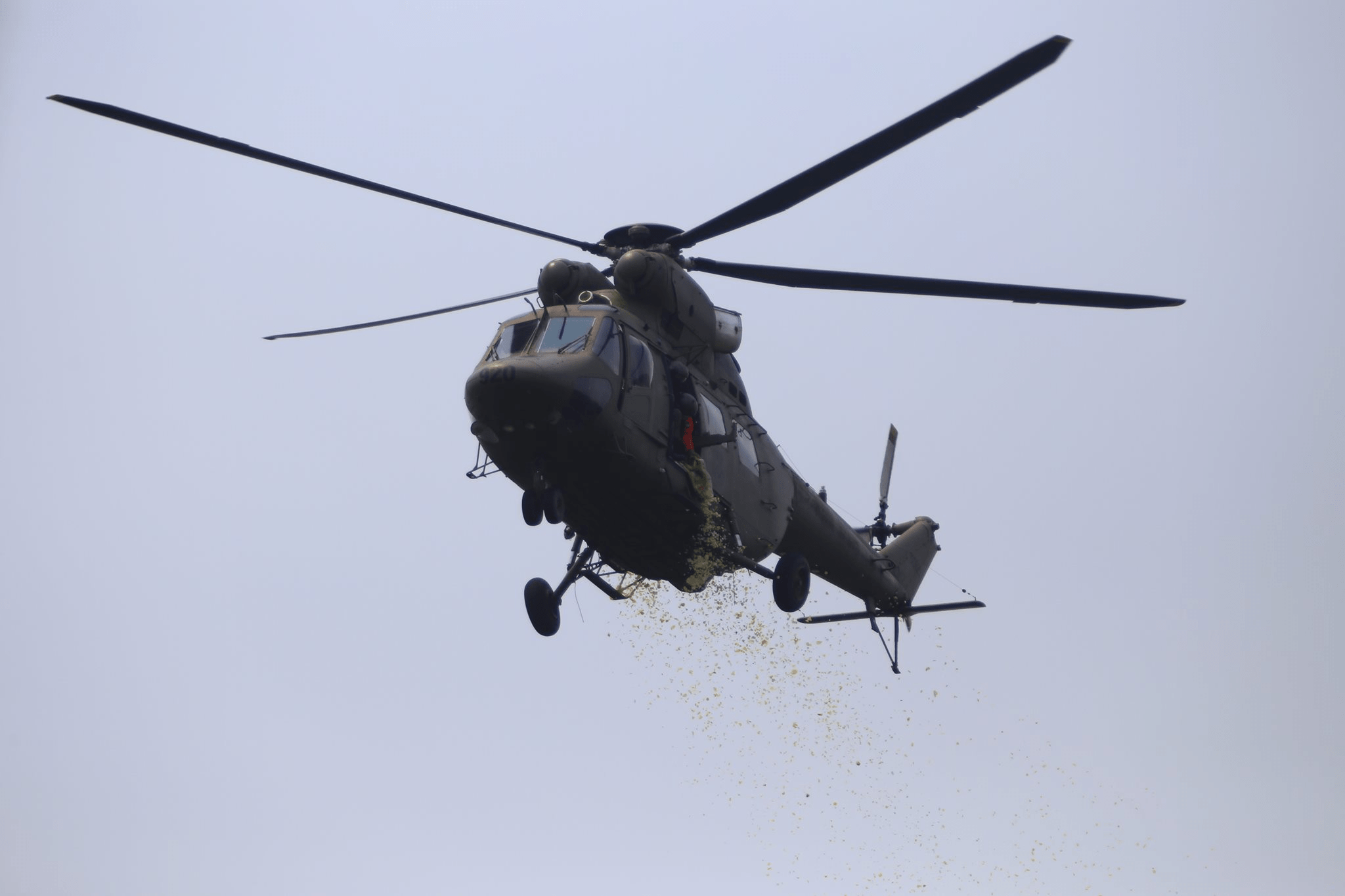 PAF's "Sokol" Helicopter, doing the traditional funeral flower drop