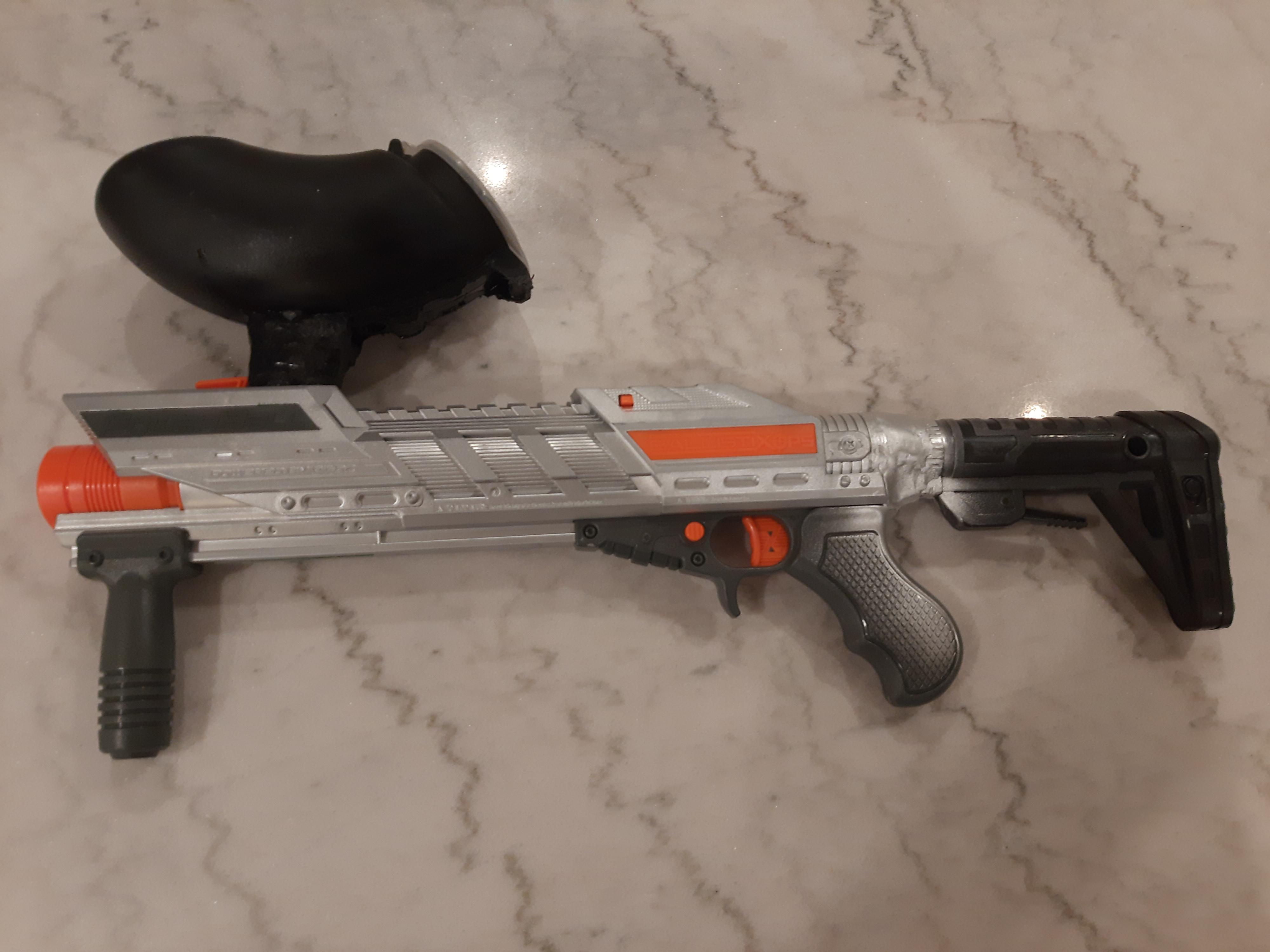 Fun thrift build. K26 with paintball hopper retrofit and Nexus stock