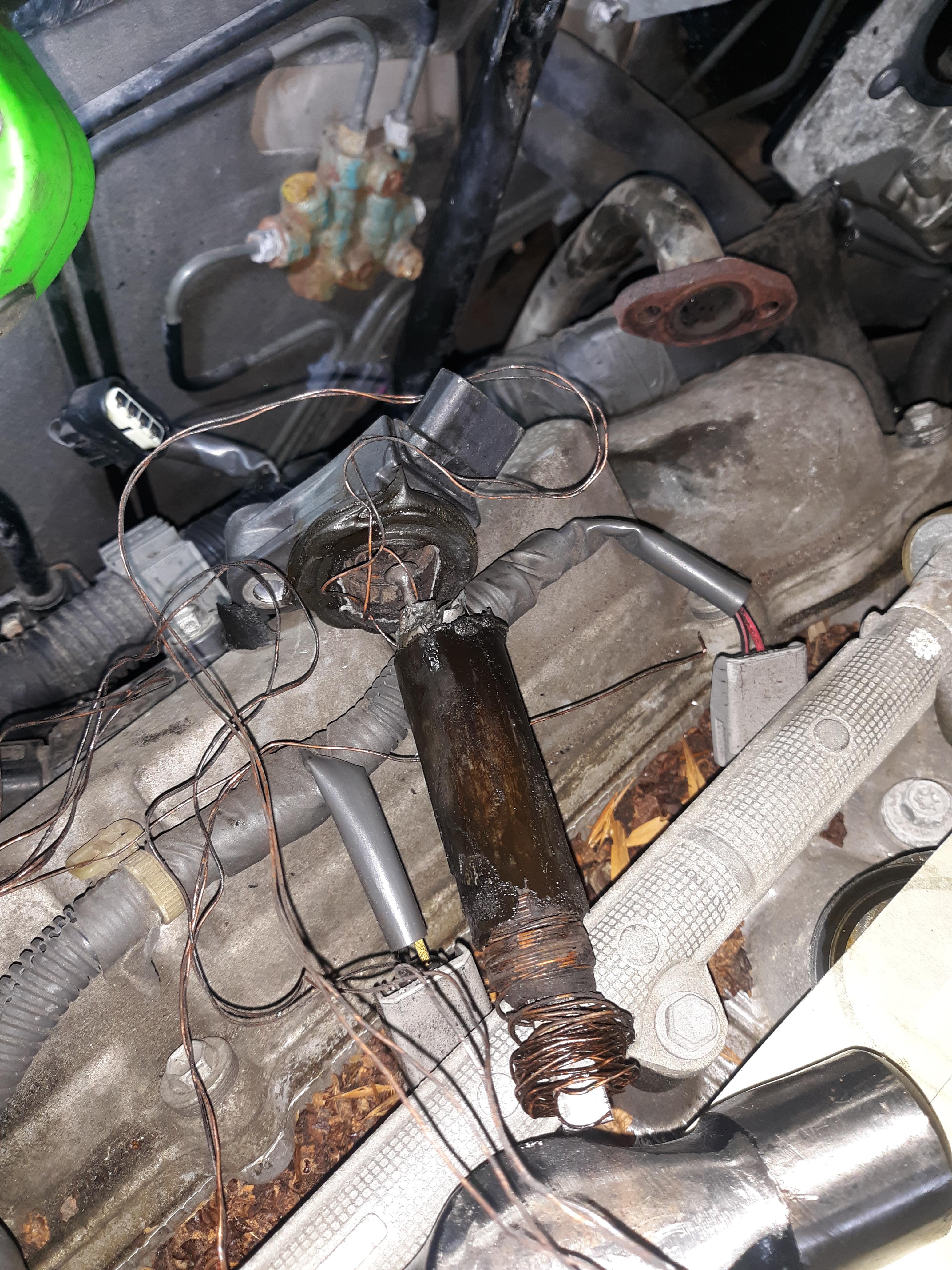 2002 toyota camry. No start, And ignition fuse keeps blowing. Rear coil