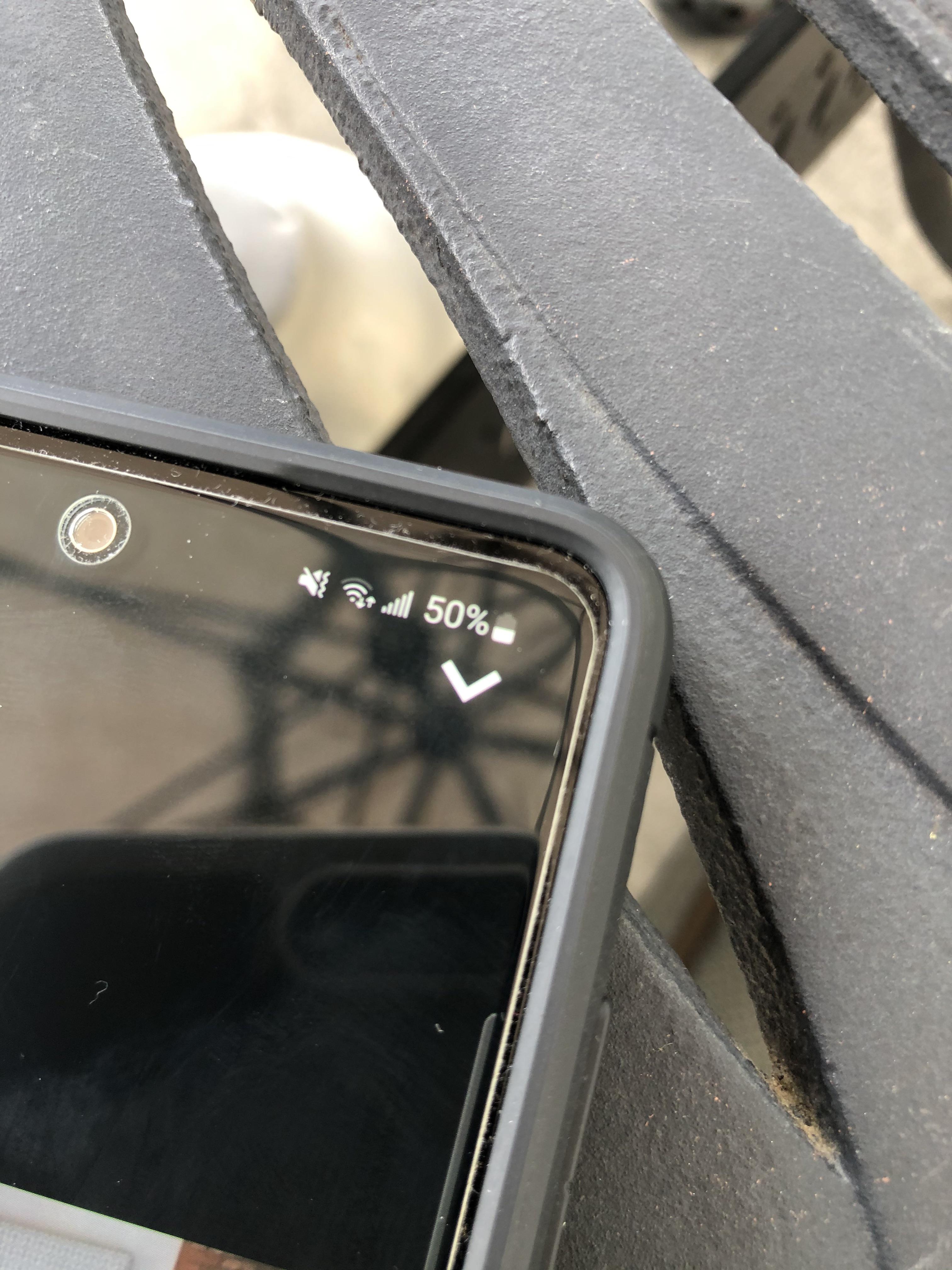 [Galaxy A52] Arrow on top right of the screen brings up web prompt whenever I swipe down or tap