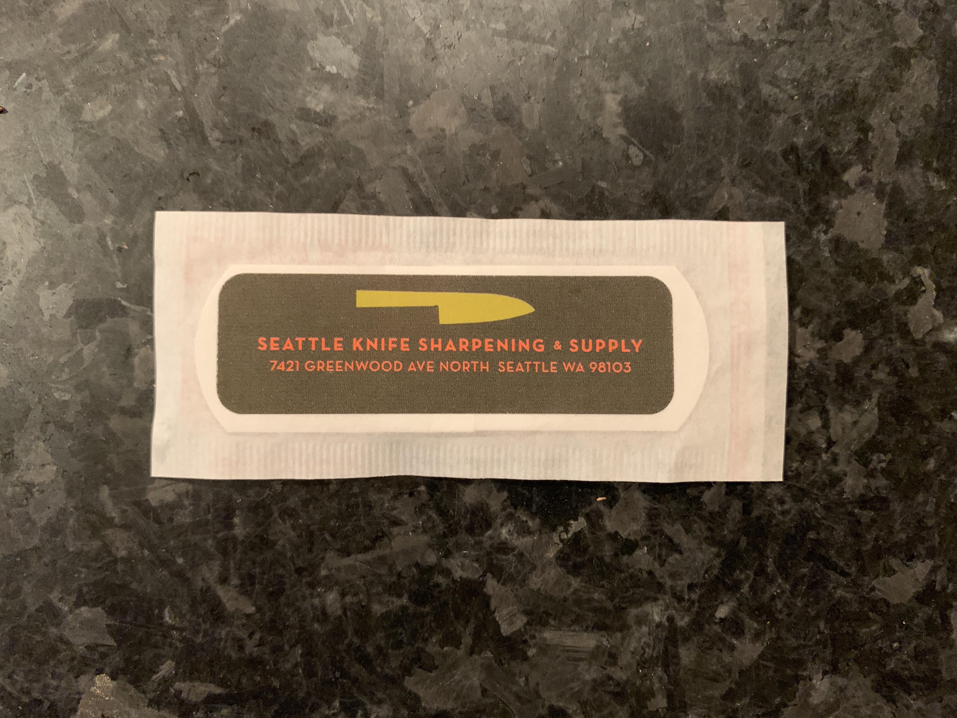 This knife sharpening company has a bandaid as its business card r