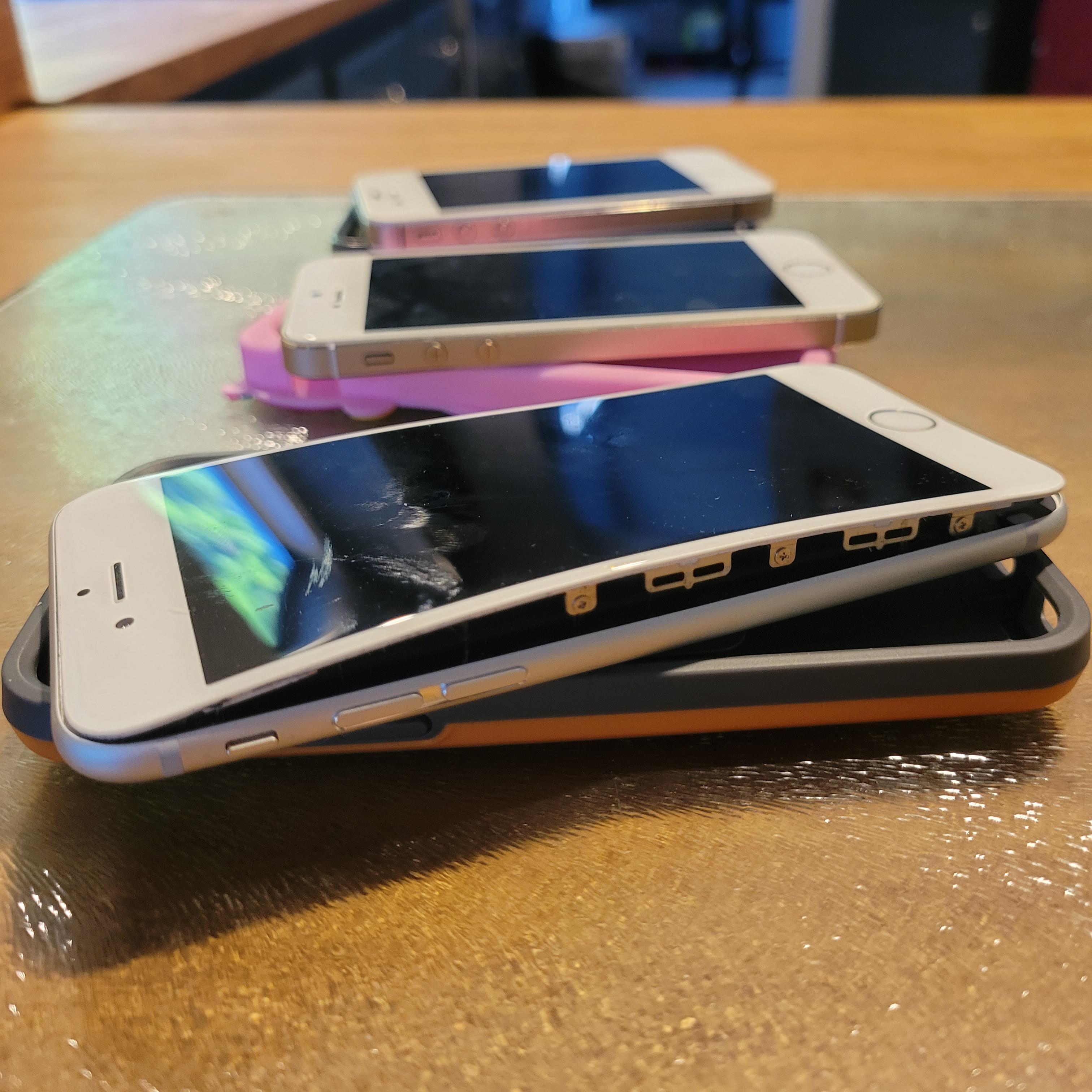Found 3 gens of old iPhones in our junk drawer. The youngest (iPhone S
