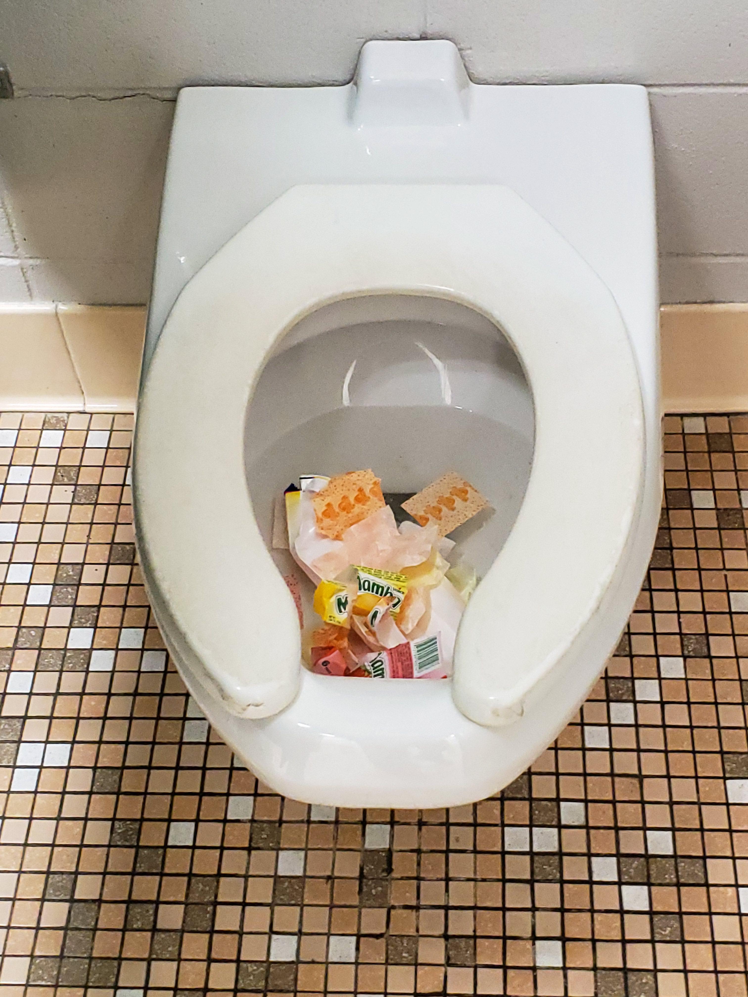 Some kid at our school put his candy wrappers in the toilet [Second