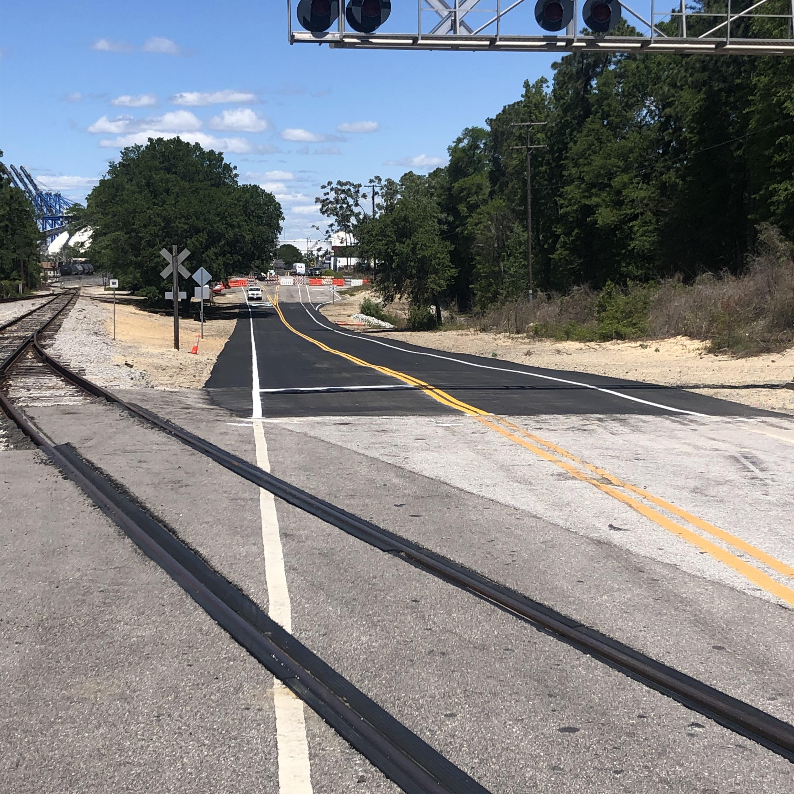 The closed section of River rd is paved and painted. Any day now. Any day r/Wilmington