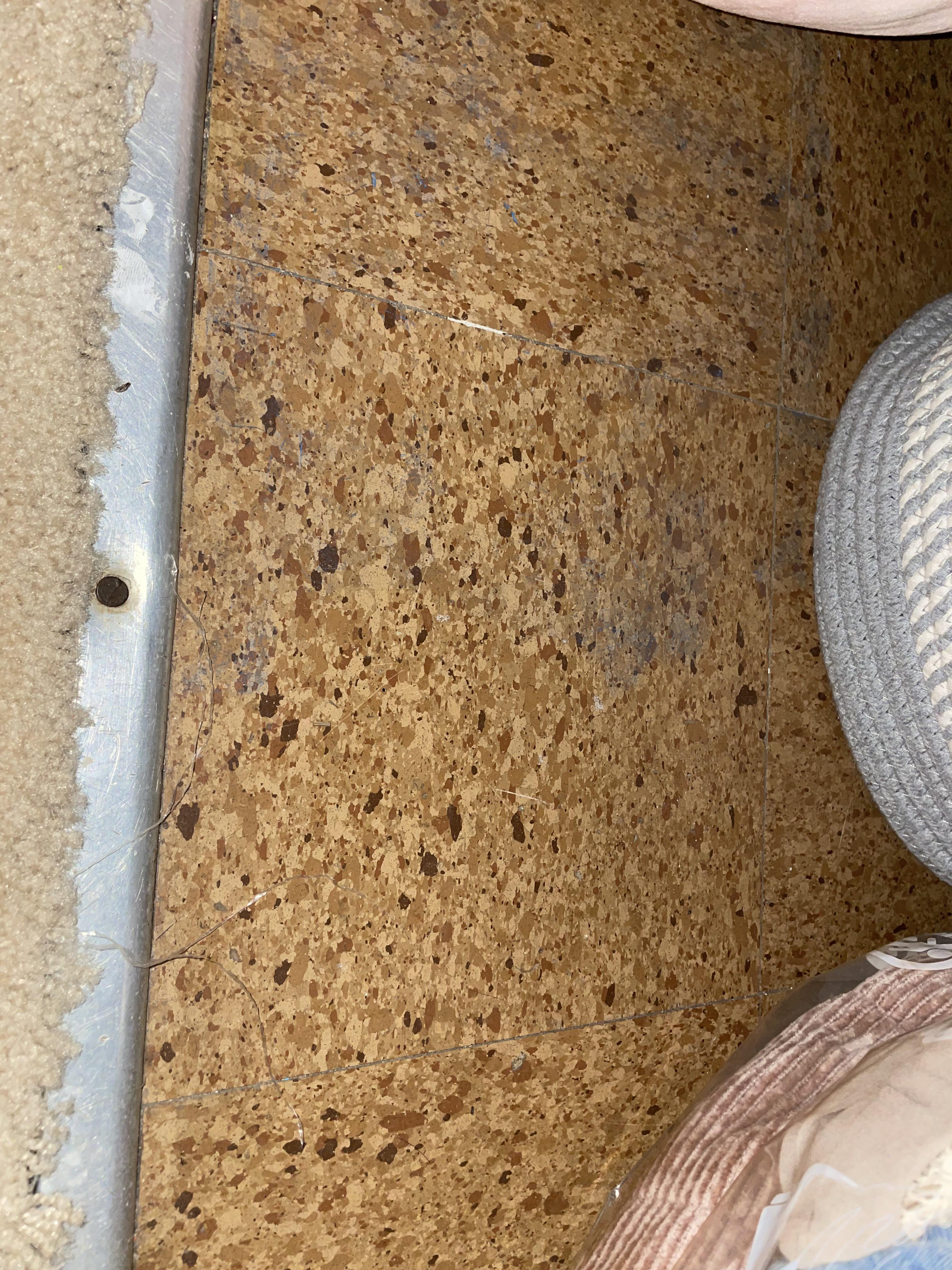 Does my 1950s home floor under my carpet have asbestos? Does anyone