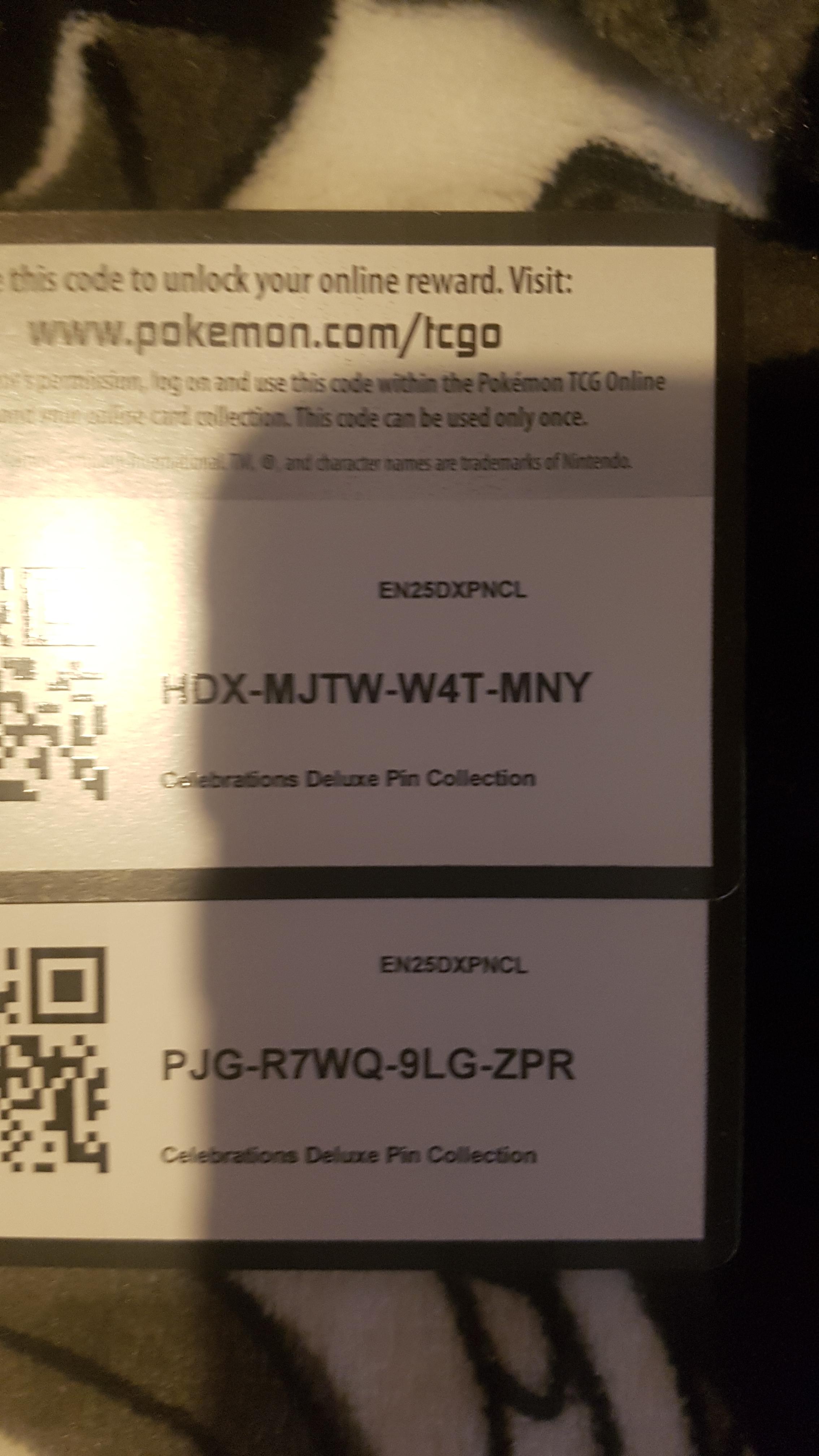 2 codes for the zacian card from the pin collection r/PokemonTCG