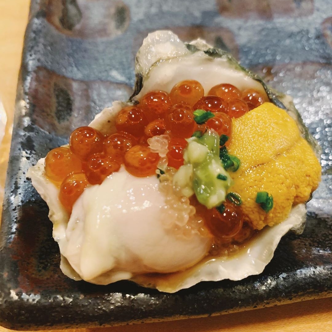 Japanese kumamoto oyster with salmon roe and california uni r/sushi