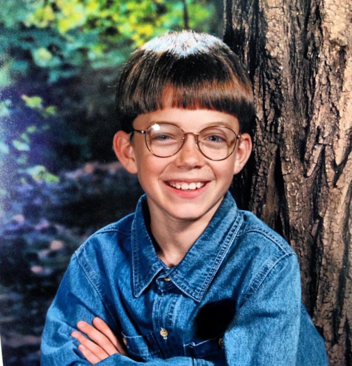 The epitome of the 90’s. Denim, bowl cut and large frame wire glasses