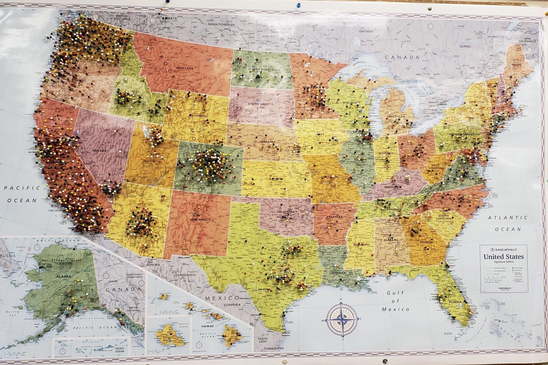 Map on the wall of the DMV in Kalispell, Montana showing where movein