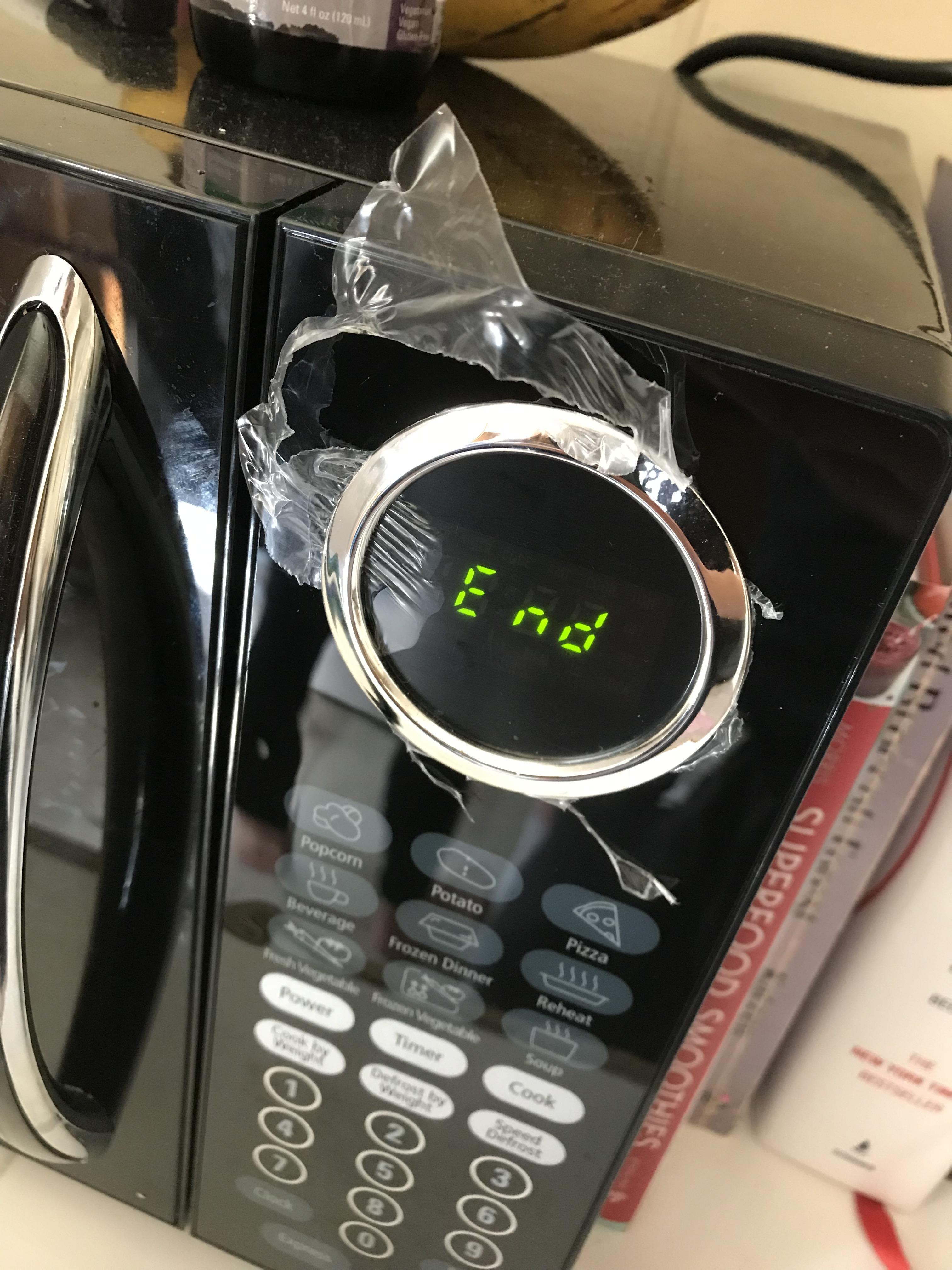 Pulling off the plastic film of a new microwave, only to discover that