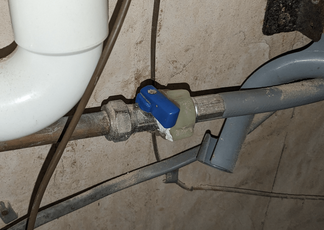 I need to turn the cold water tap on for my dishwasher but it's blocked