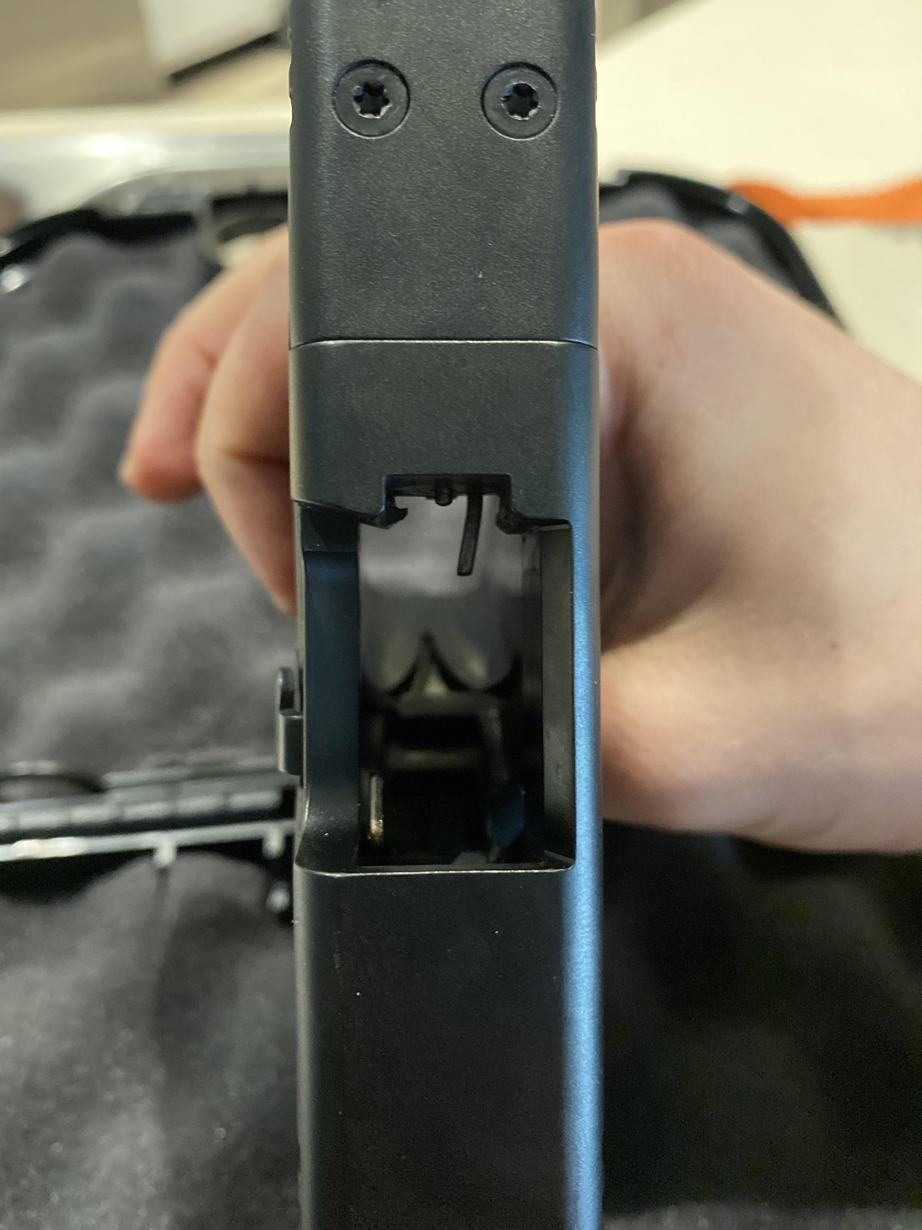 Is it normal for the firing pin to stick out bast the breech face when