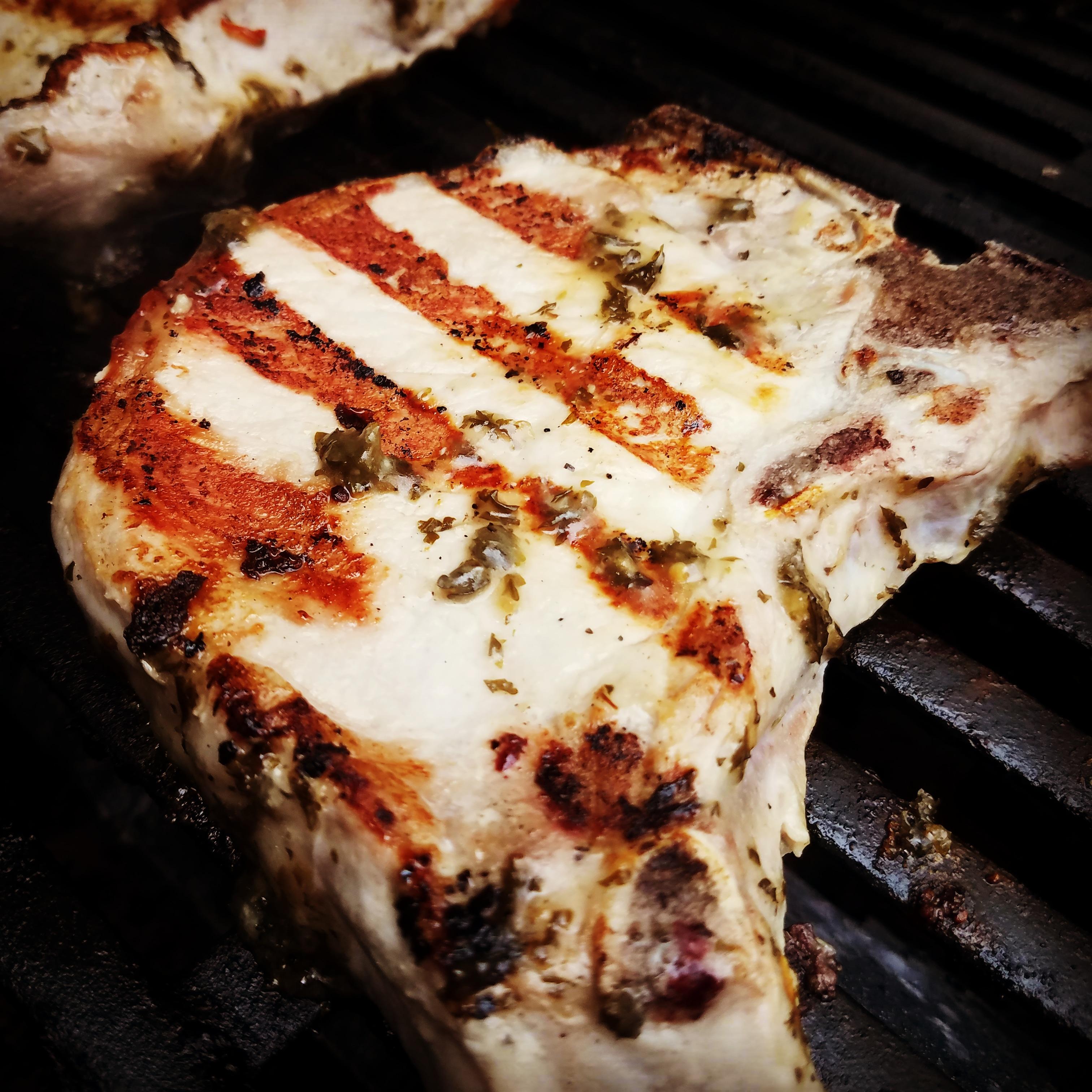 Bonein pork chops on the er. Going with chimichurri. r/grilling