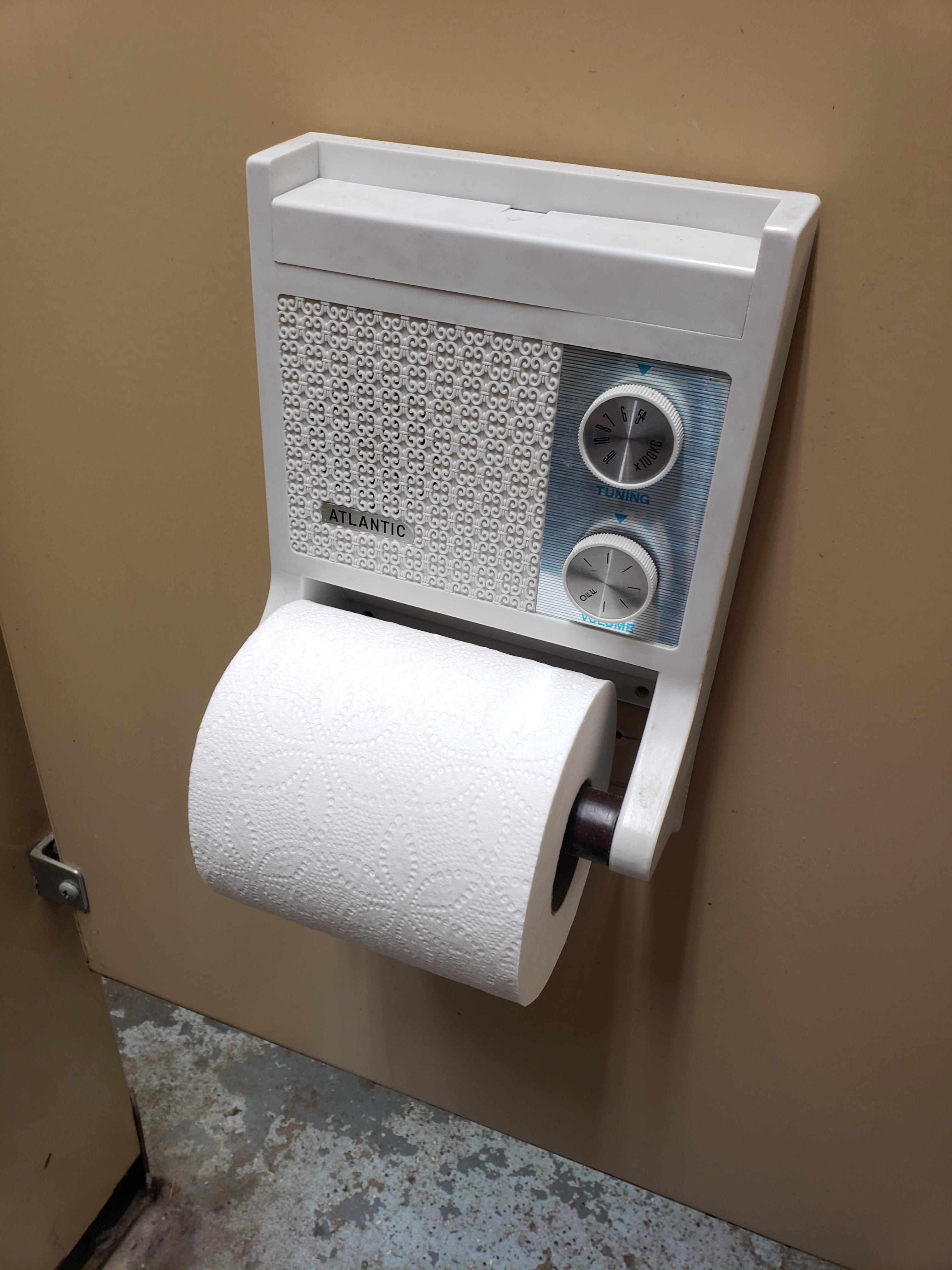 The bathroom im using has toilet paper holders with built in radios in