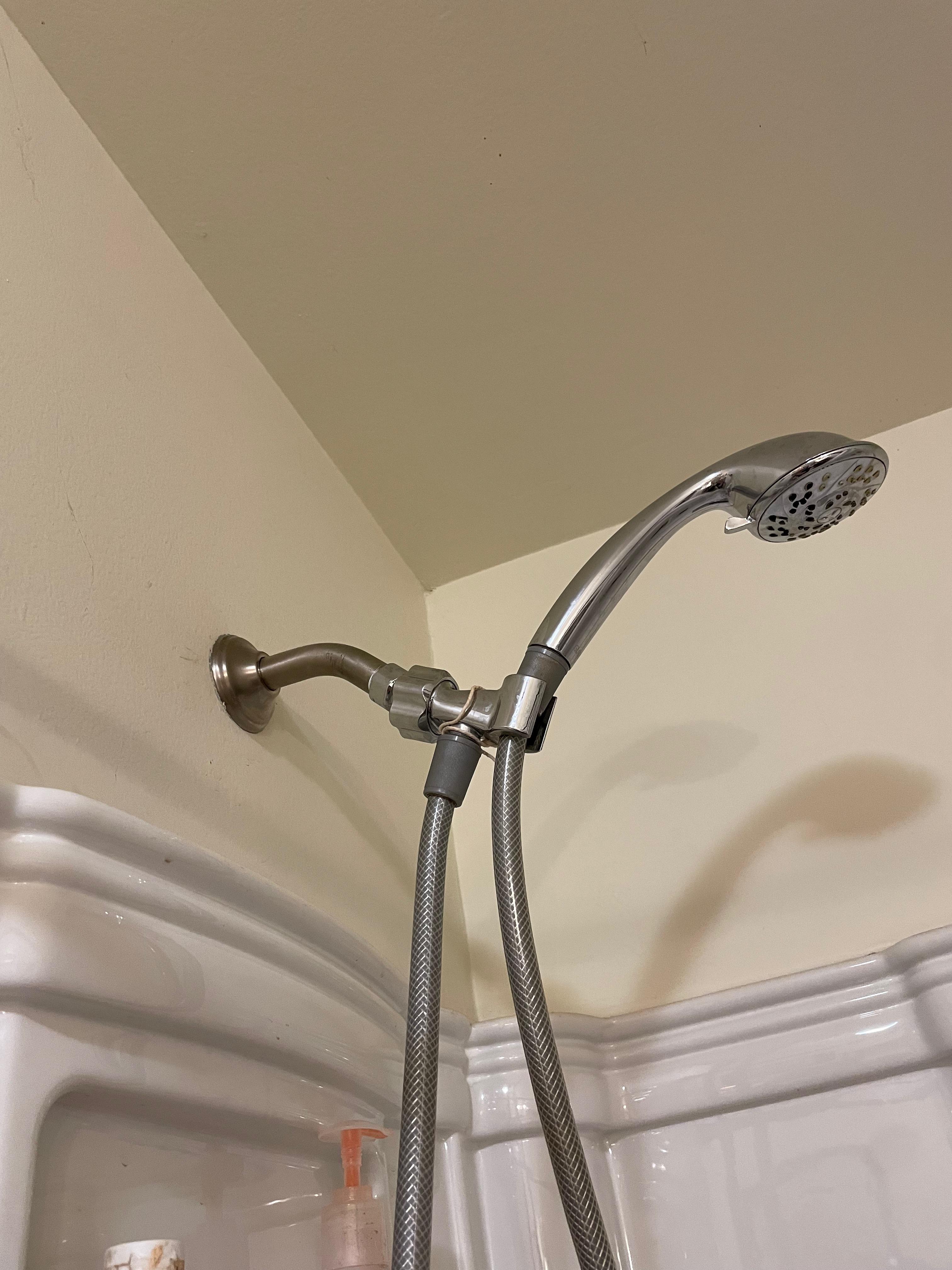 Shower too high on wall, is there an extension or something I can use