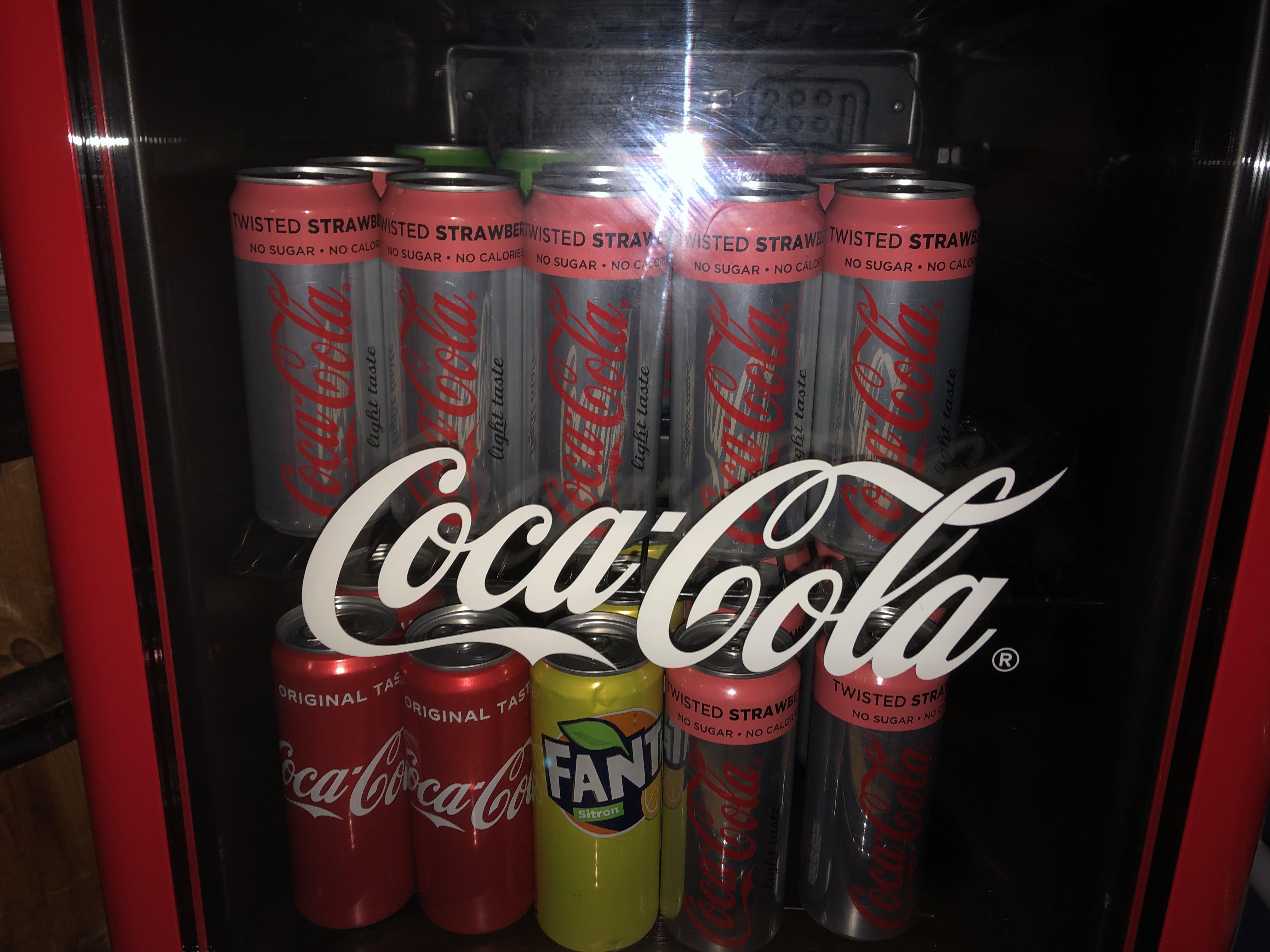 My Coca Cola fridge in the summer, I miss Coke light/Diet Coke twisted strawberry. r/Soda