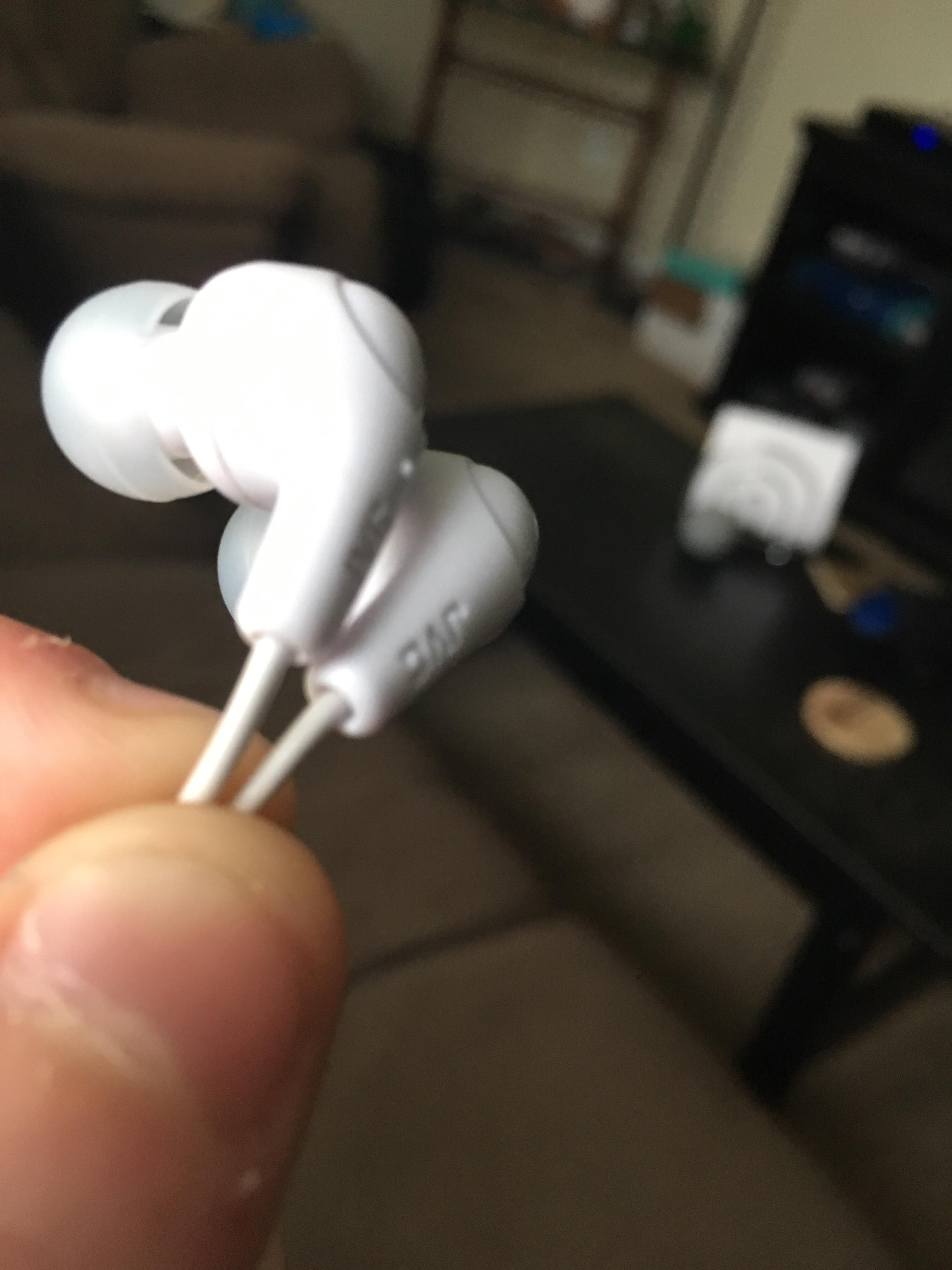 My headphones have a bump on the left earbud so you can tell what