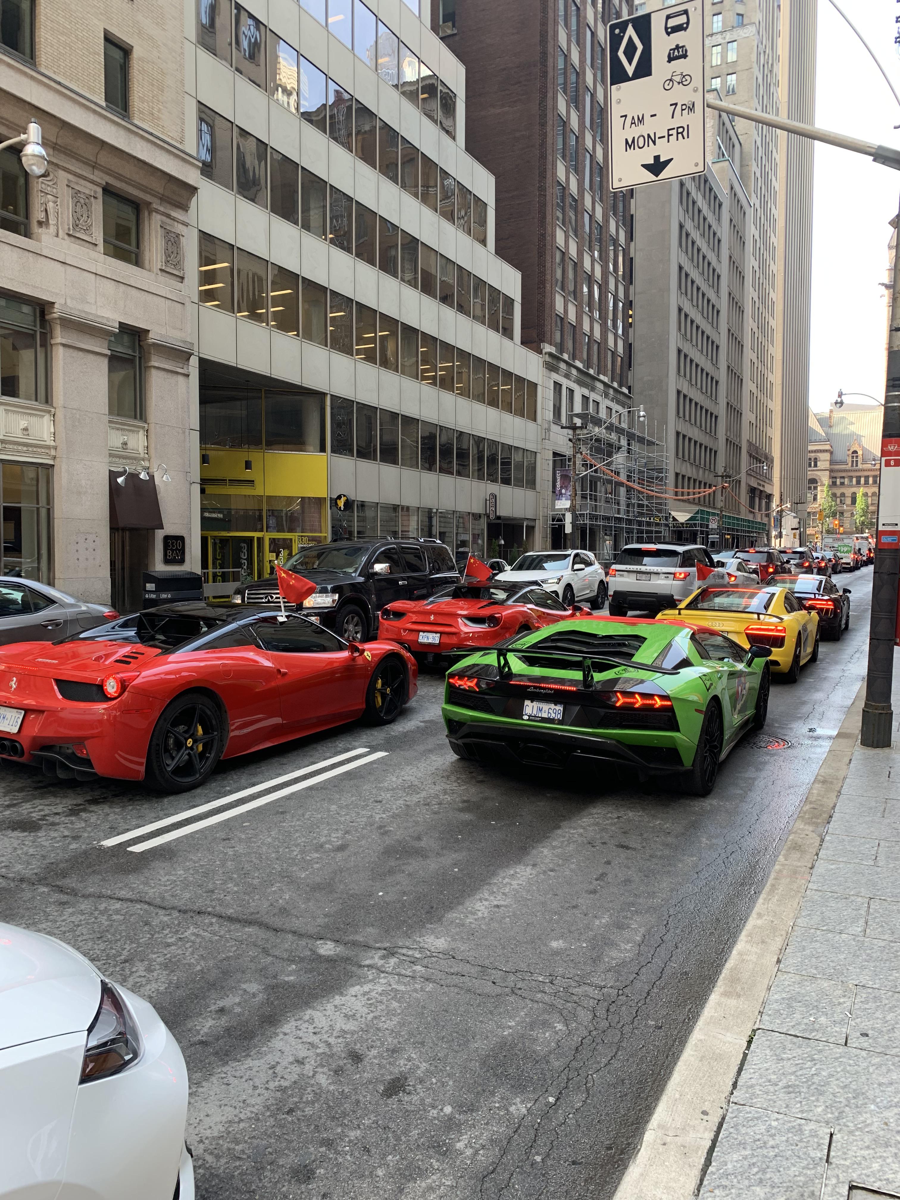 Lots of exotic cars we’re out reving for a protest downtown Toronto