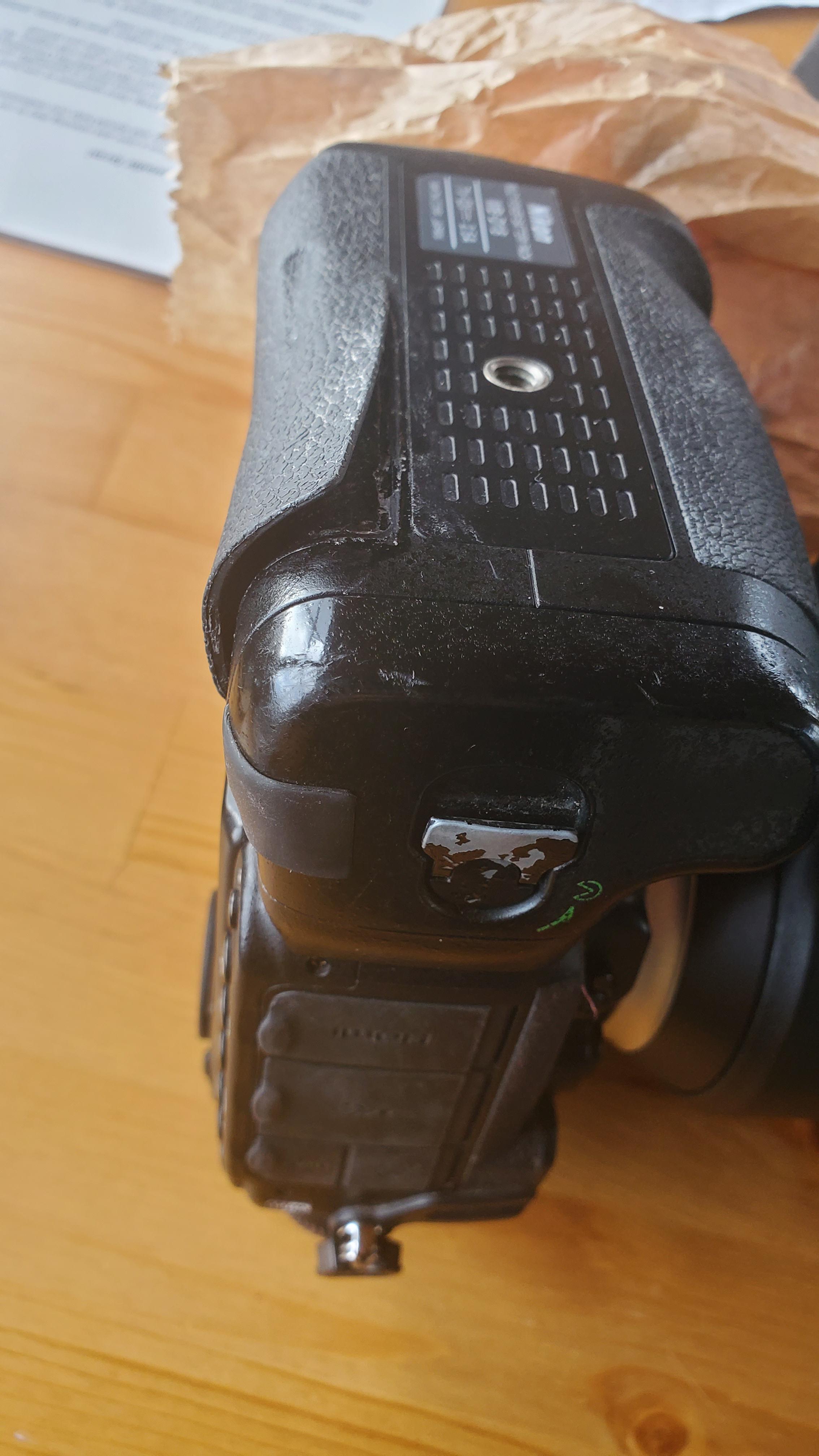 Rubber grip on battery grip coming off. Any solutions? r/Nikon