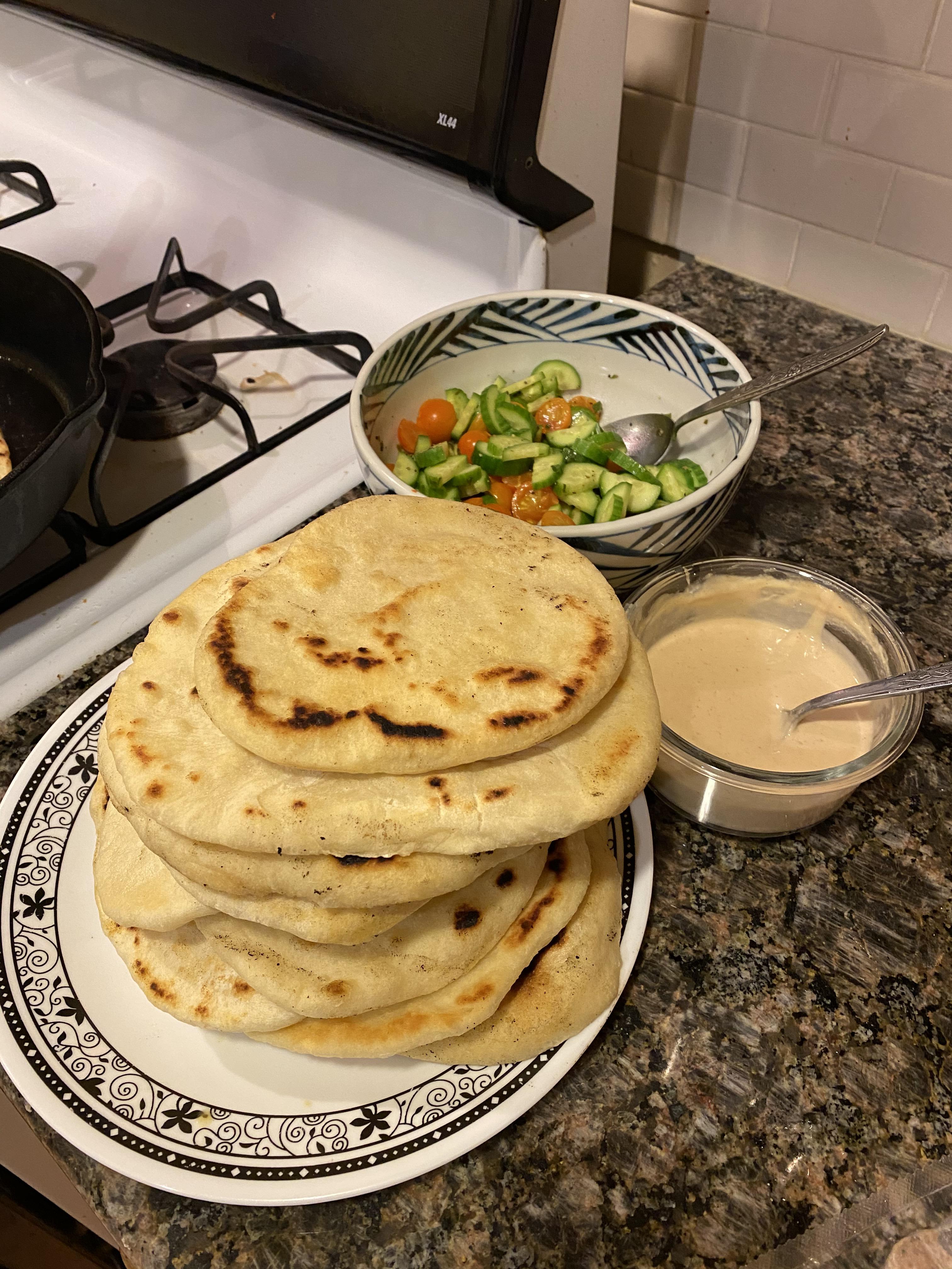 Homemade pita bread, gyros sizzling outside the frame r/TheHighChef