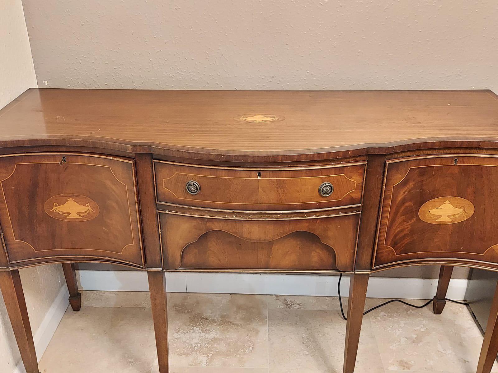 hey, does anyone know how much this sideboard is worth? furniture