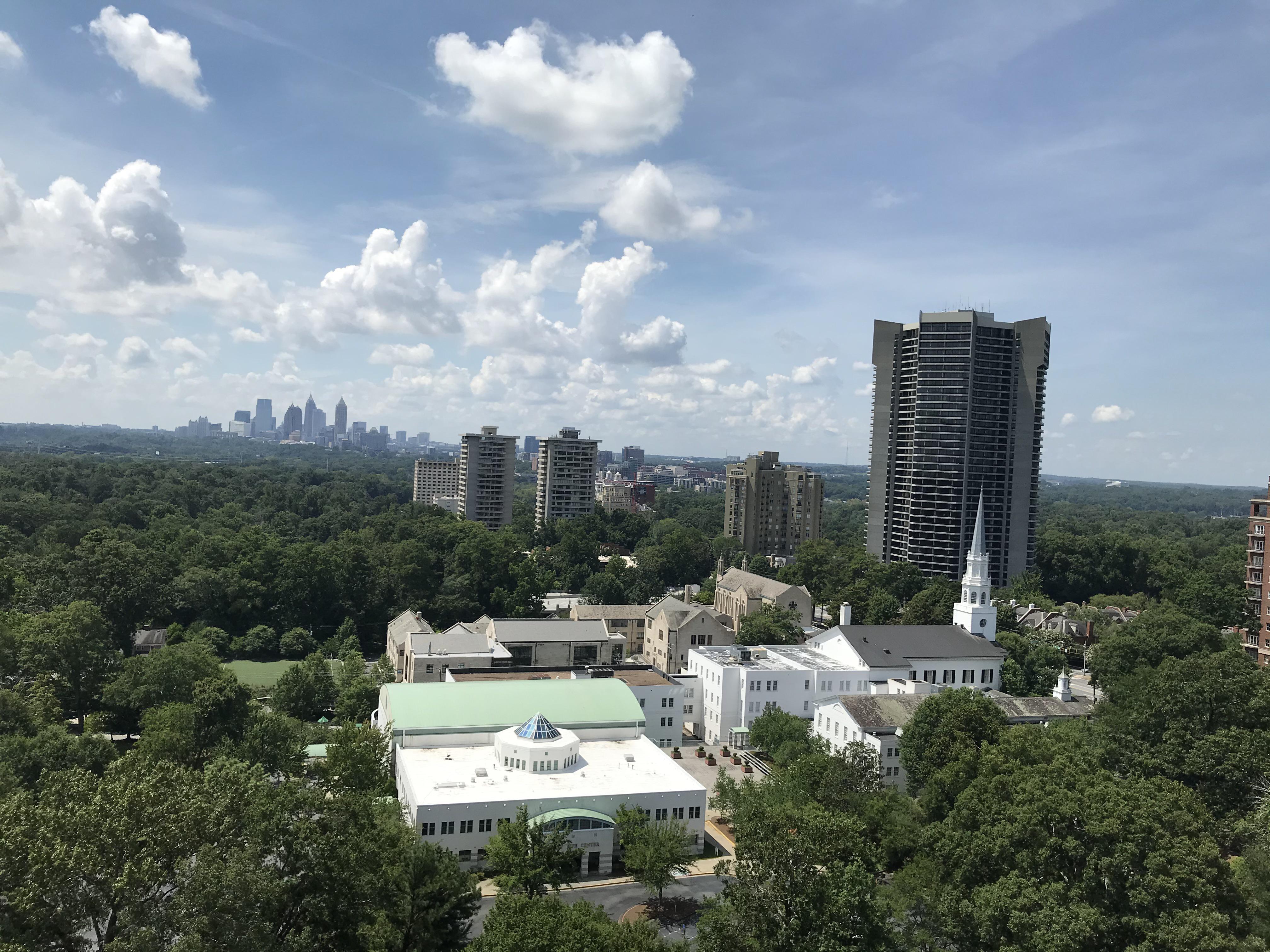 My view for work today, love my city hidden in the leaves r/Atlanta