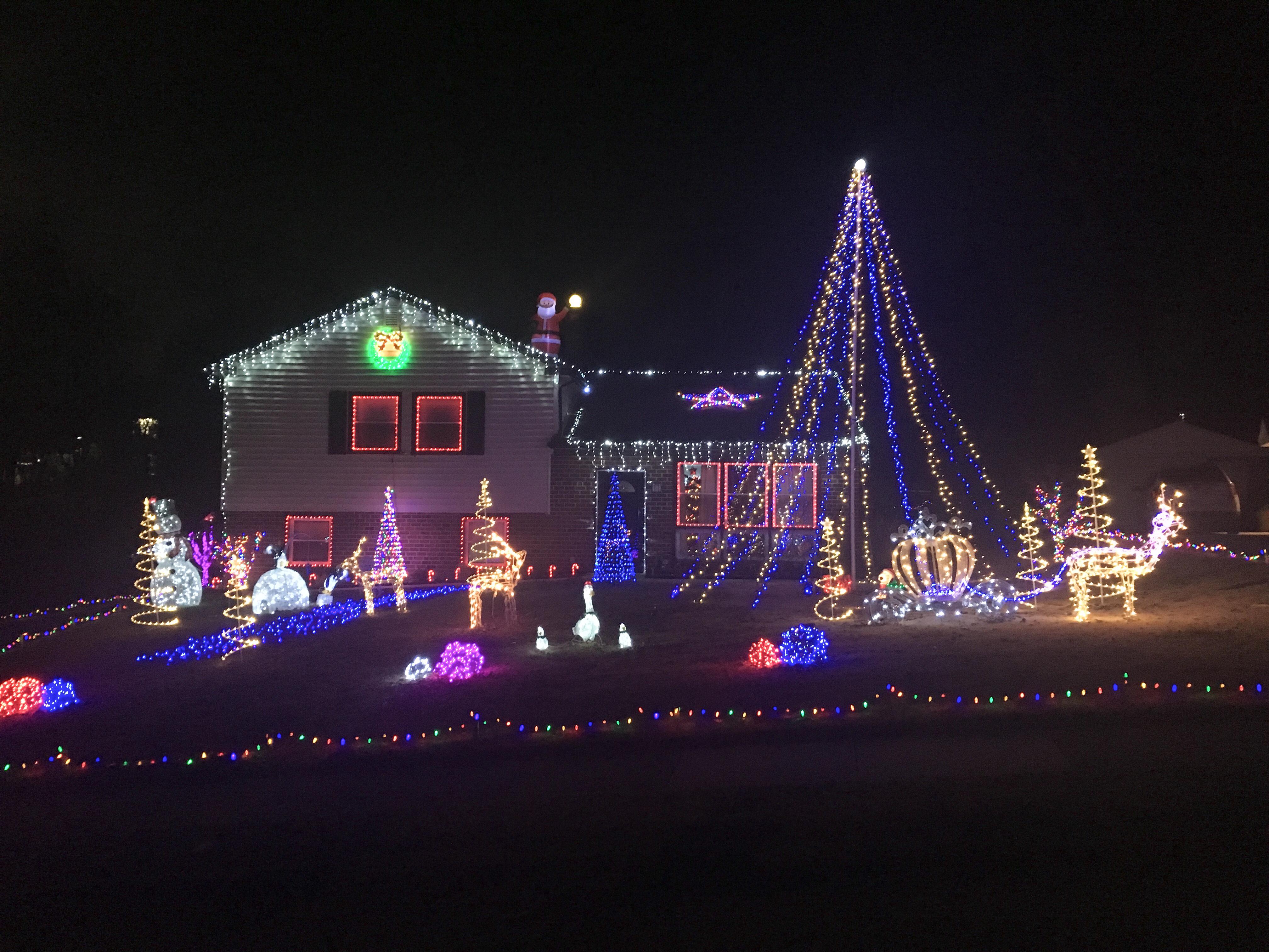 We added the flagpole, roof Santa and wreath this year. Just hit 15,000