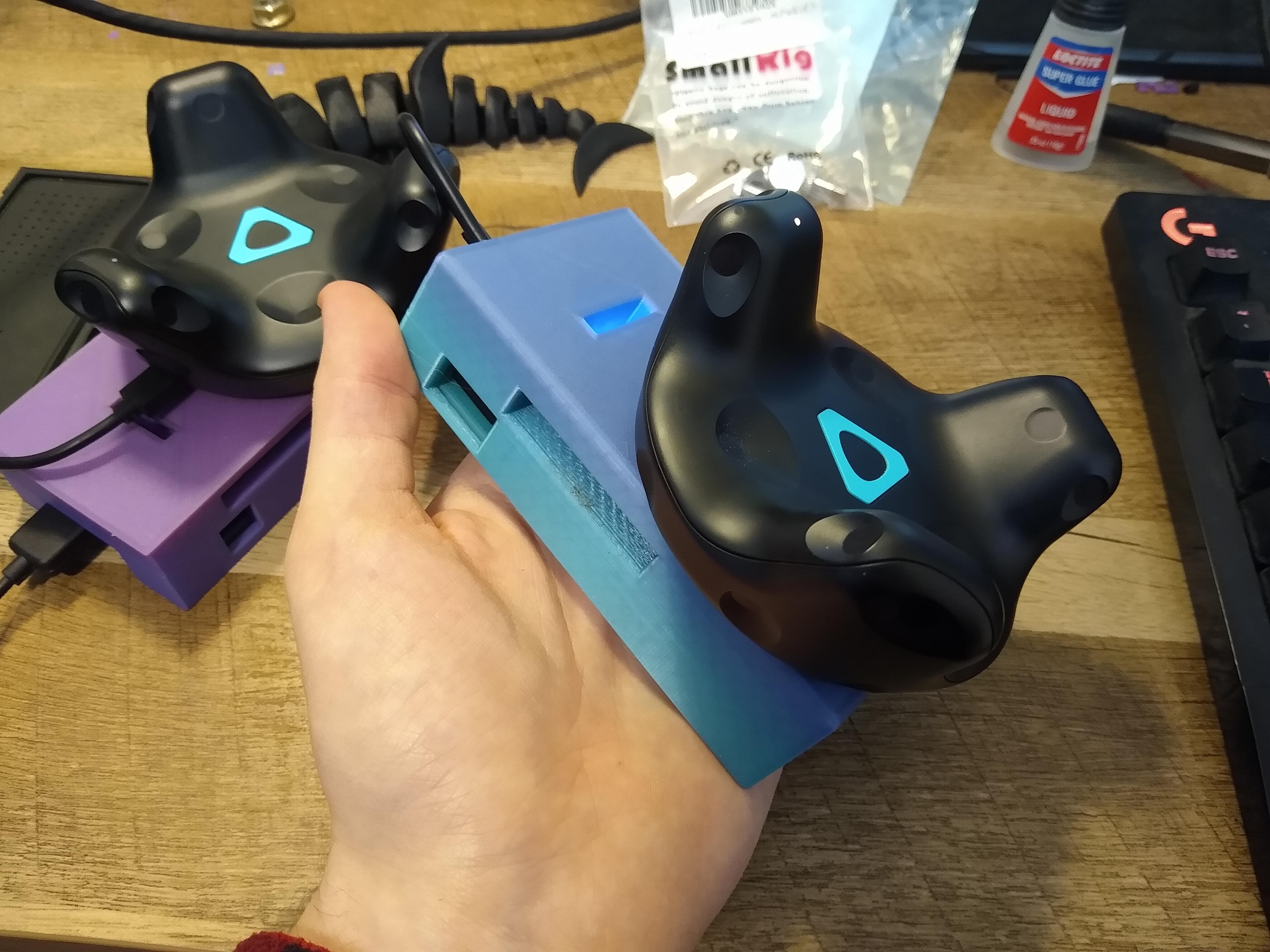 Designed an printed a battery pack hip mount for HTC vive trackers that charges through pogo