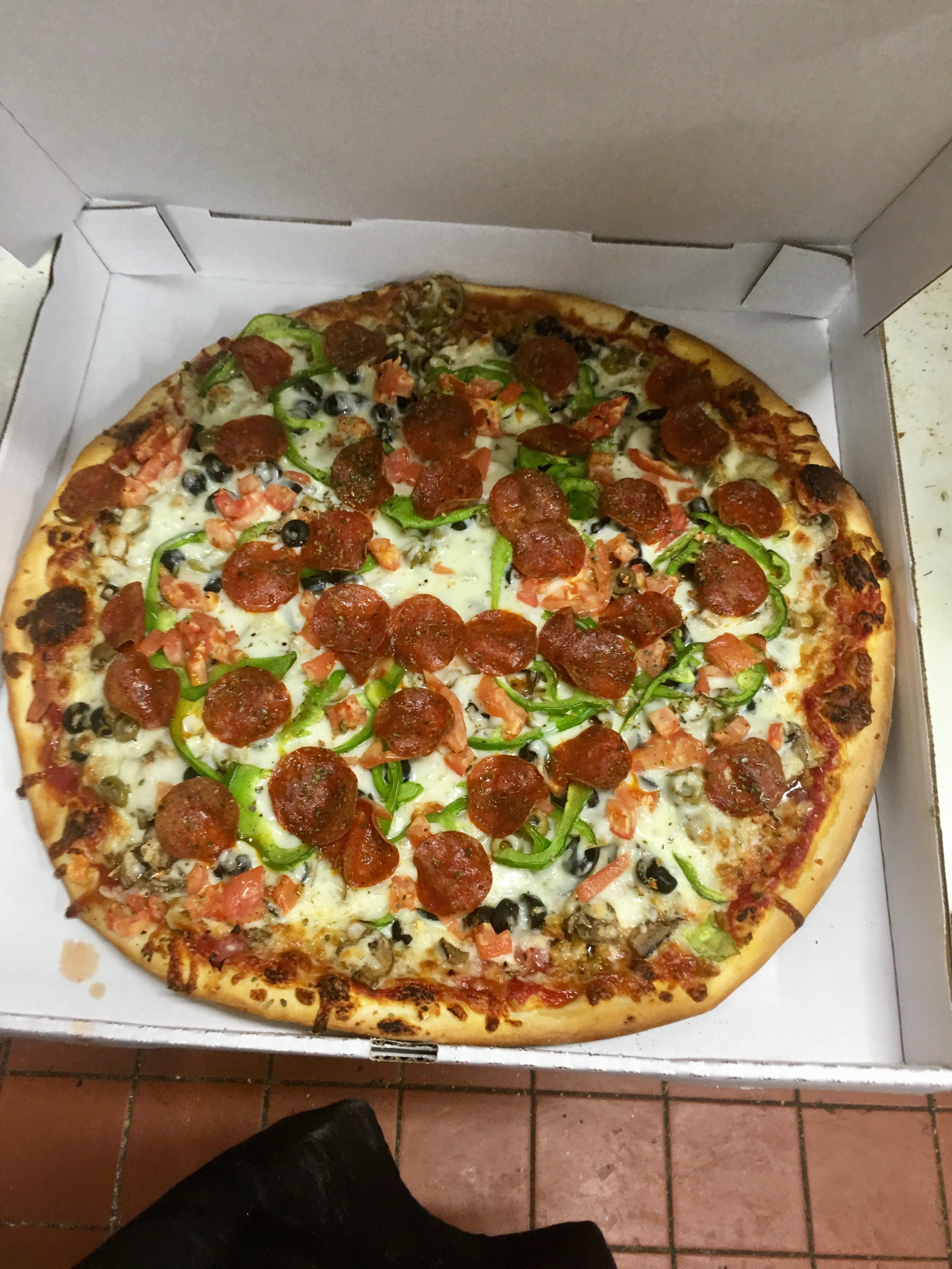 The Deli sausage, onion, mushroom, green pepper, pepperoni, tomato