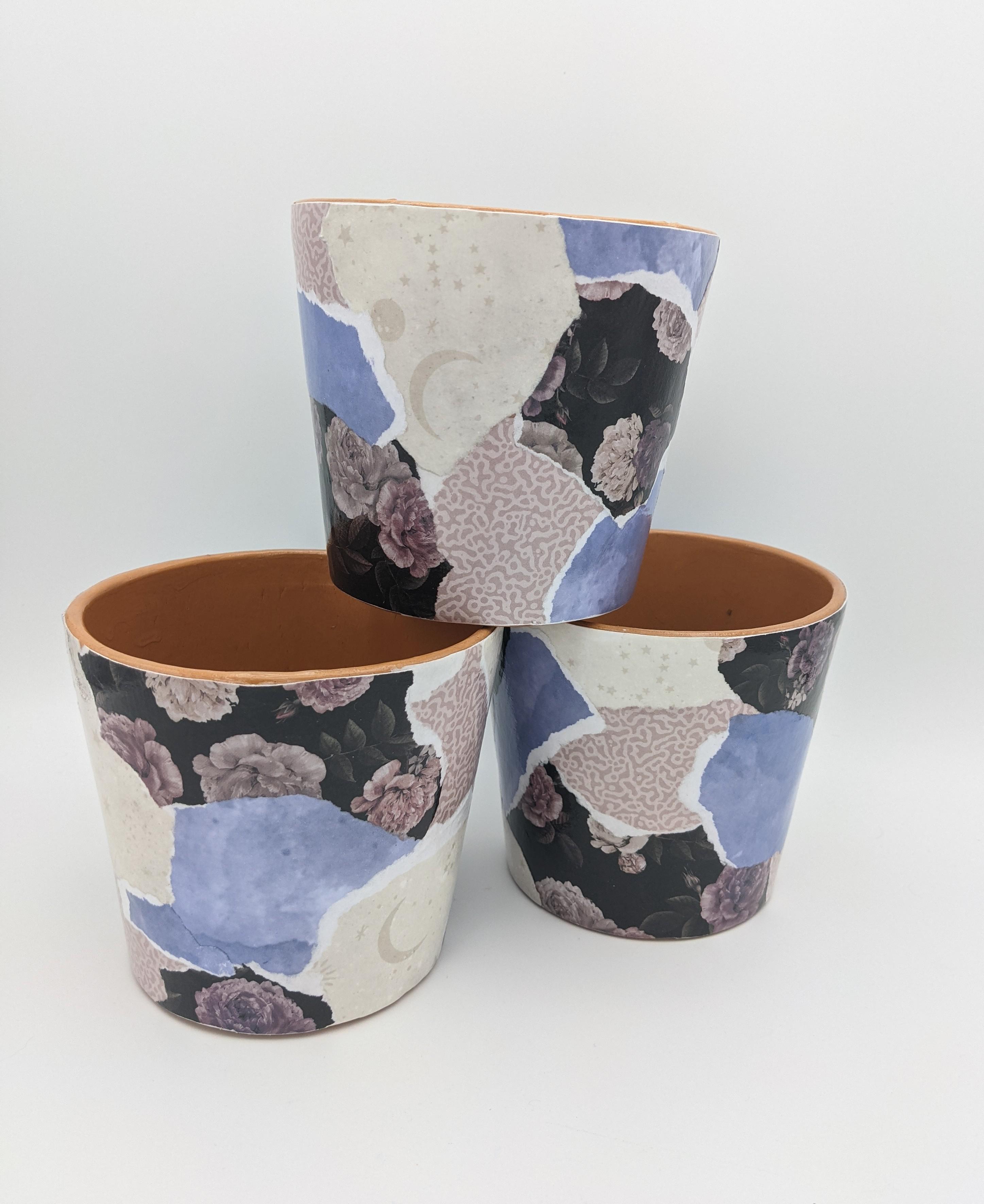 Decoupage flower pots. I'm in love with these papers together. r