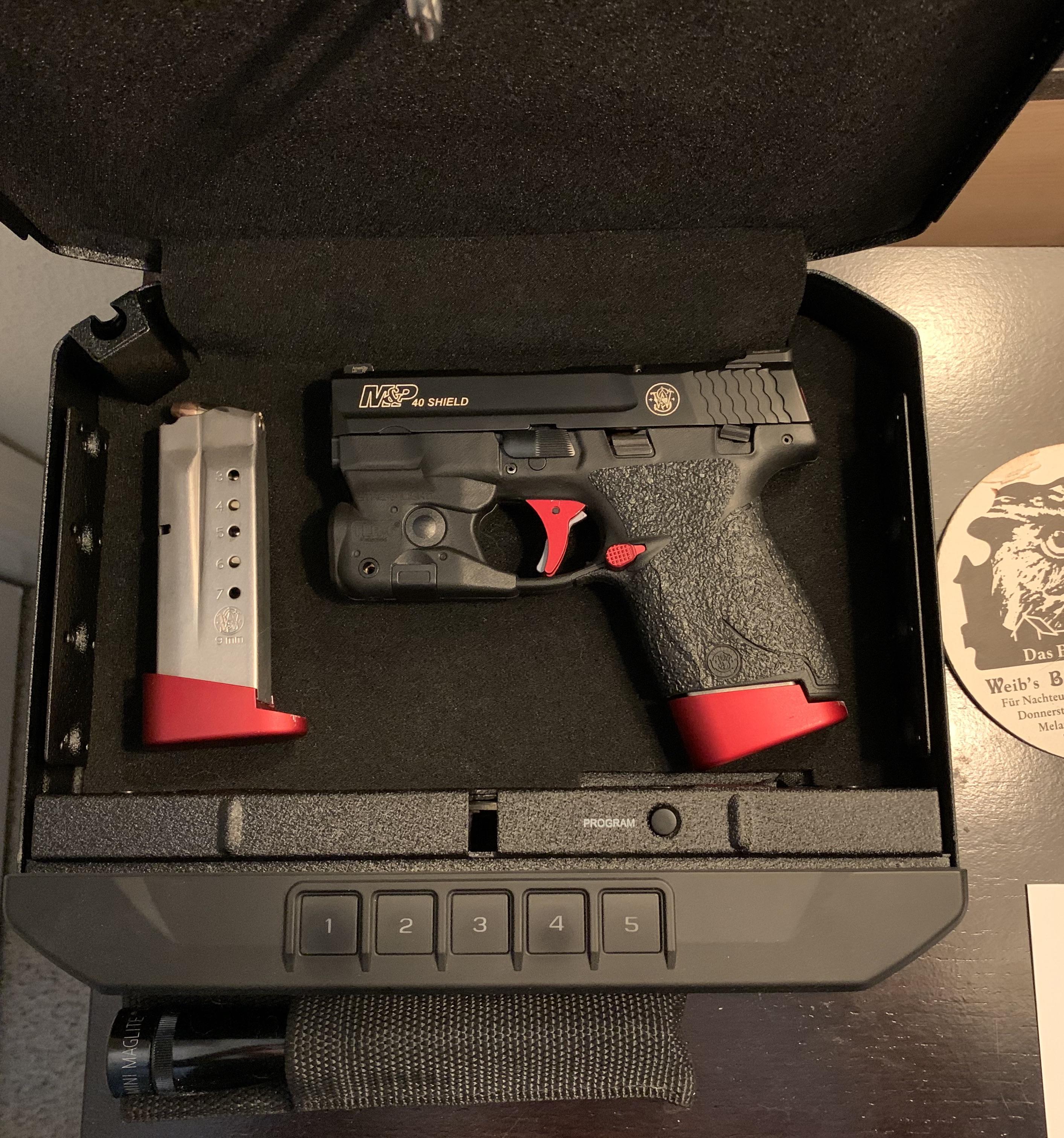 Shield .40 S&W, with several mods 9mm conversion barrel, Hyve Technologies red Monarch trigger