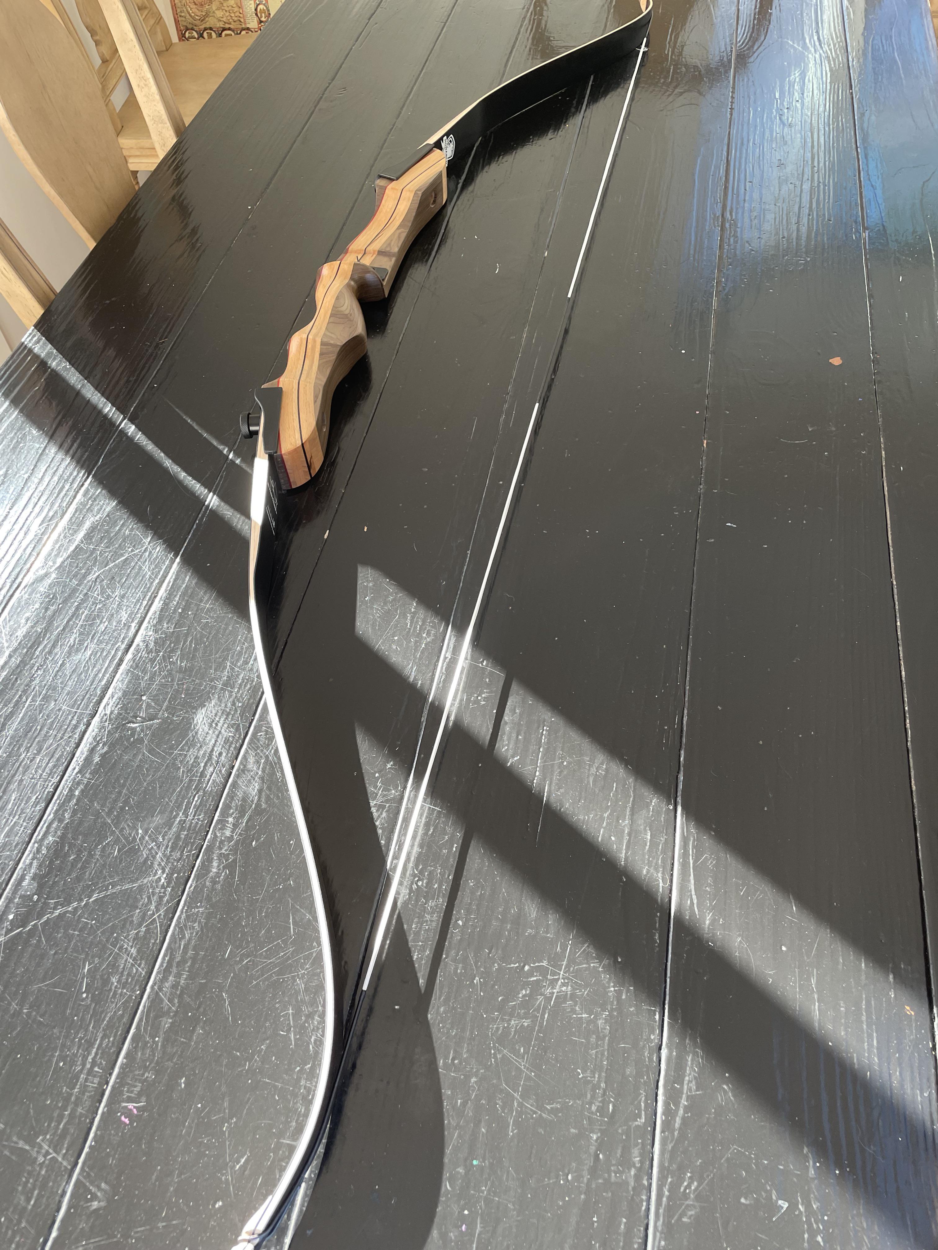 Monarch Fleetwood recurve 62 inch bow with 58 inch 12 strand white