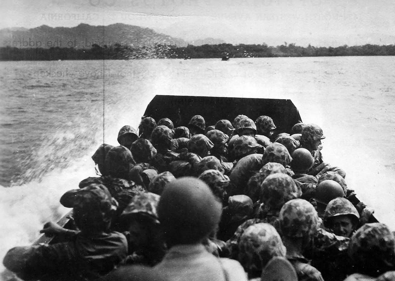 Landing craft loaded with 3rd Division Marines heading for the beach on